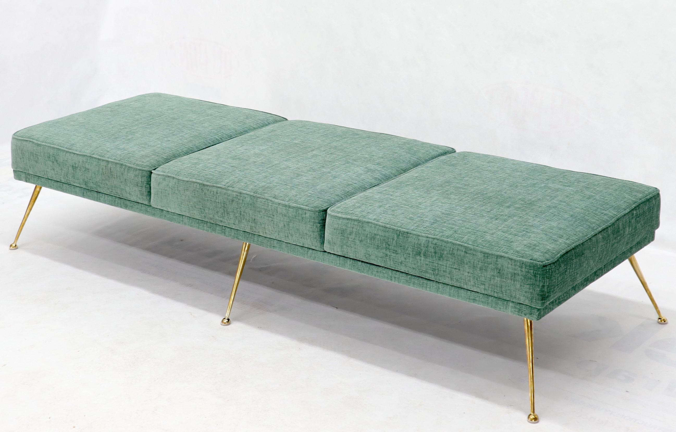 Fully redone pair of Italian Mid-Century Modern six-legged upholstered brass legs day beds or wide benches.