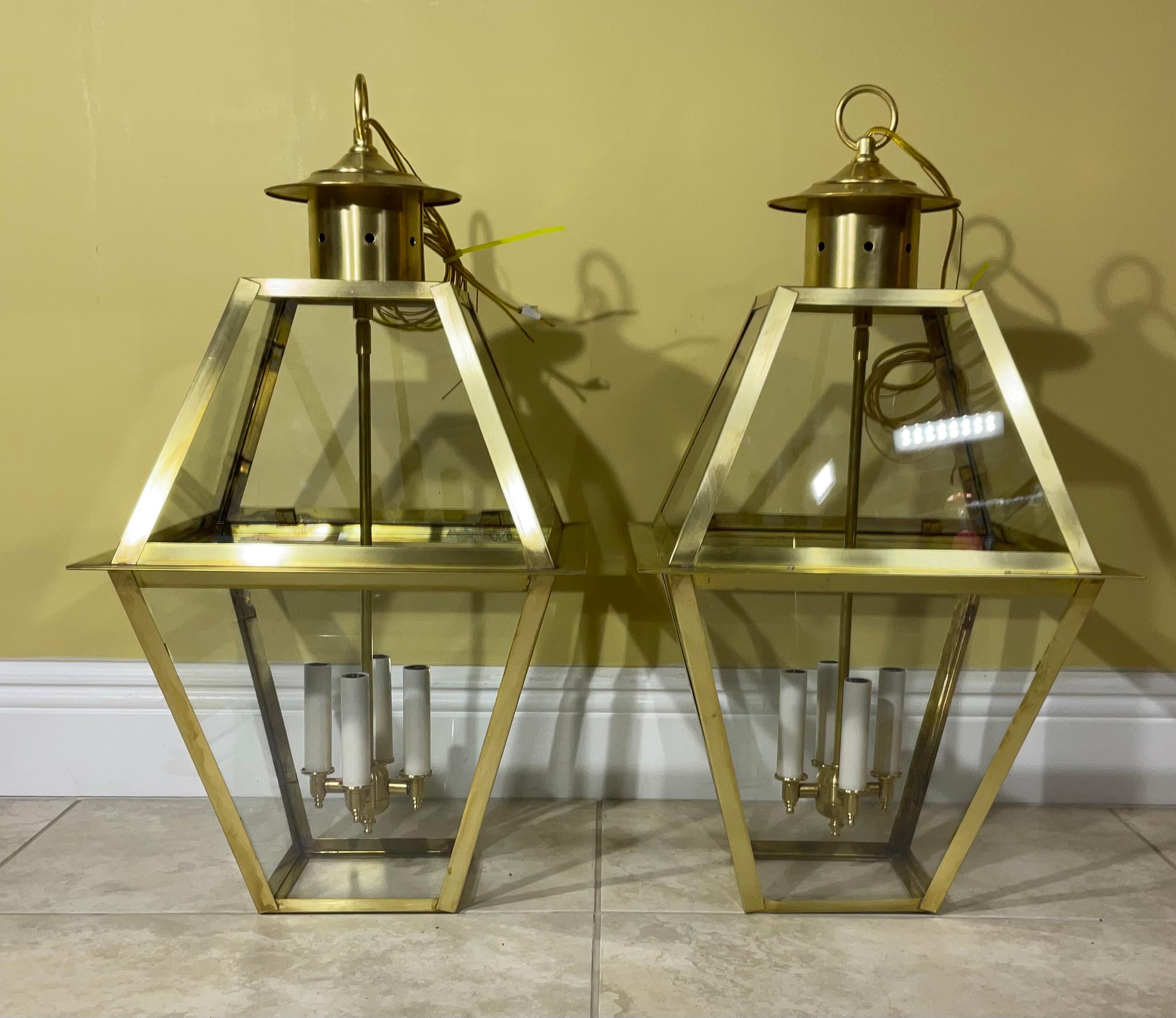Exceptional six sides hanging pair of lanterns made of handcrafted solid  brass with four 60/watt lights, ,suitable for wet location Made in the US ,up to US code ,UL approved  ,great look indoor or outdoor.  canopy and chain included.