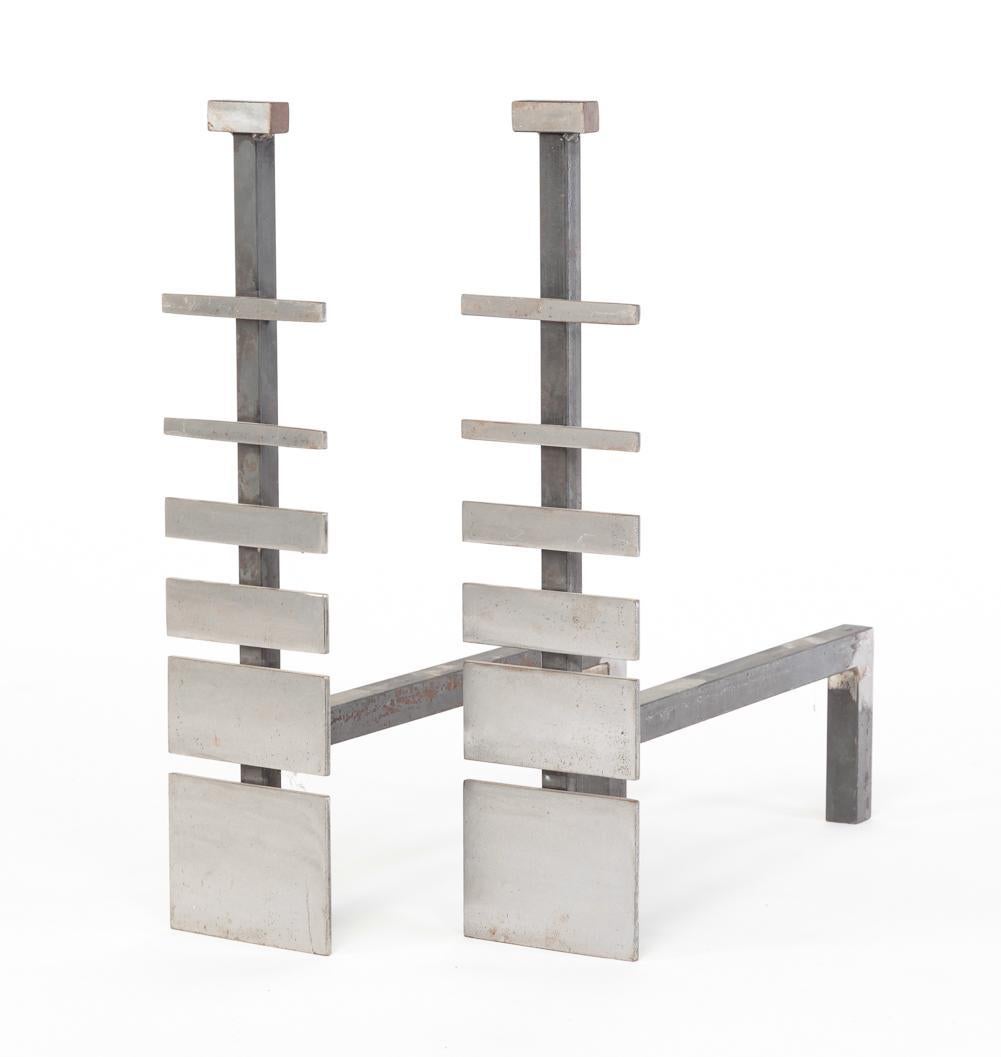 A pair of custom-designed one-of-a-kind MCM brushed steel andirons. Unique and beautiful design.

note: inspired by the mathematical Fibonacci sequence ( an old formula for elegance).