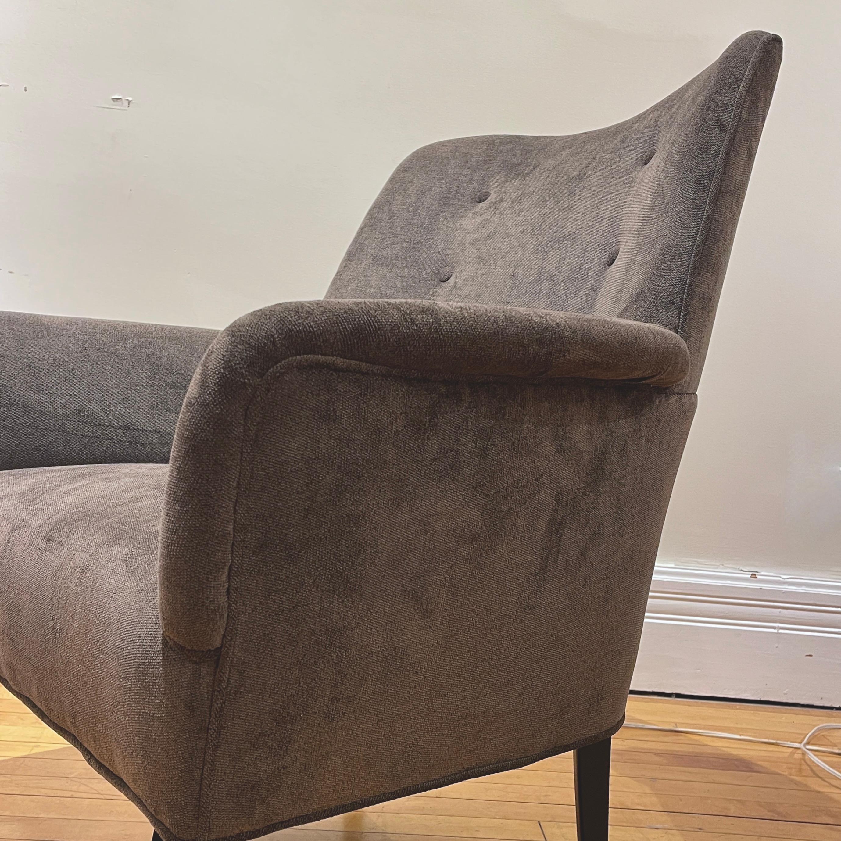 Stunning pair of Italian lounge chairs from the 1960s. Reupholstered in a deep grey velvet type upholstery. 
Absolutely stunning sculptural midcentury modern lounge chairs.