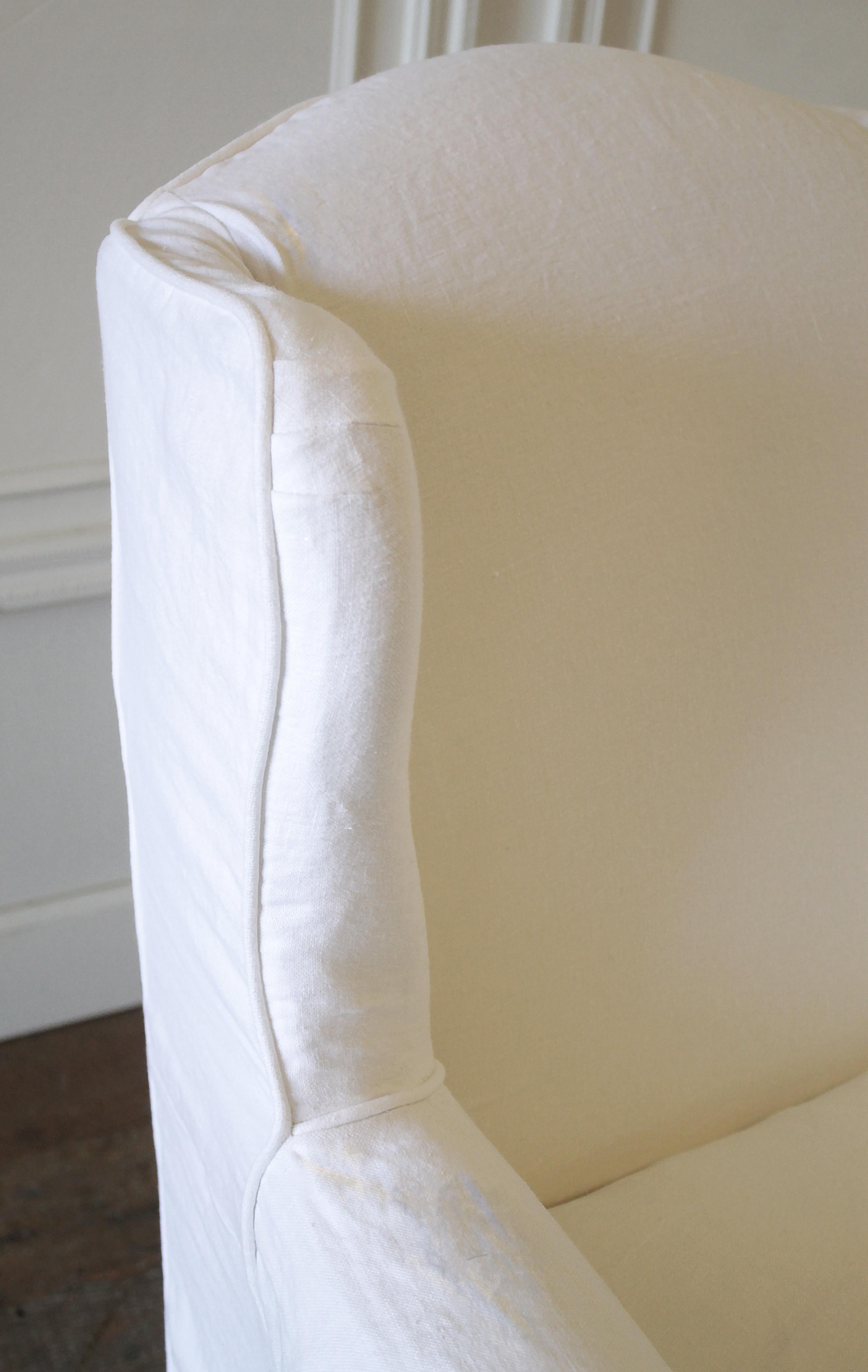 Romantic Pair of Slip Covered Linen Wing Chairs with Ruffle Skirt