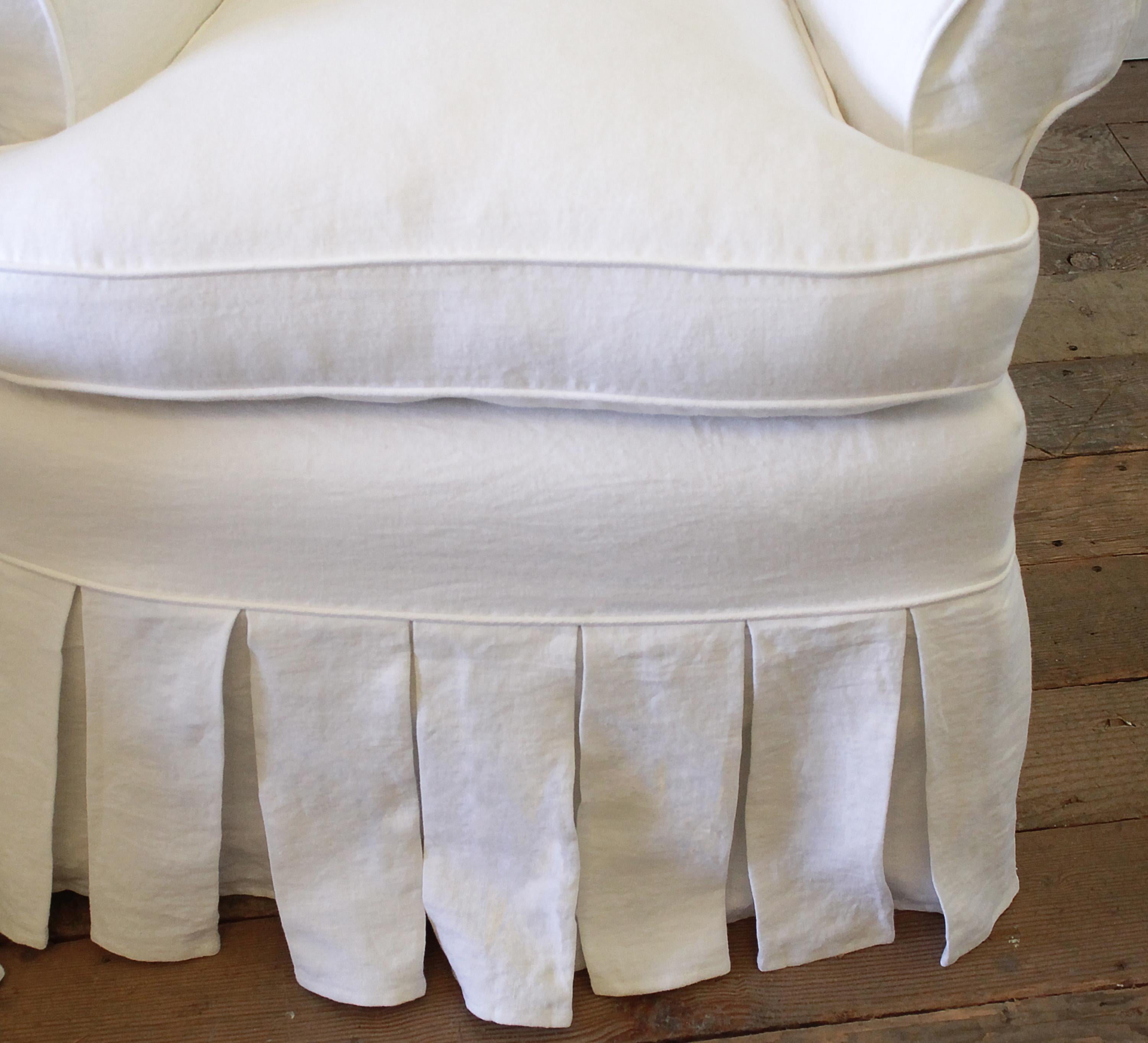 Pair of Slip Covered Linen Wing Chairs with Ruffle Skirt In Good Condition In Old Town Orange, CA