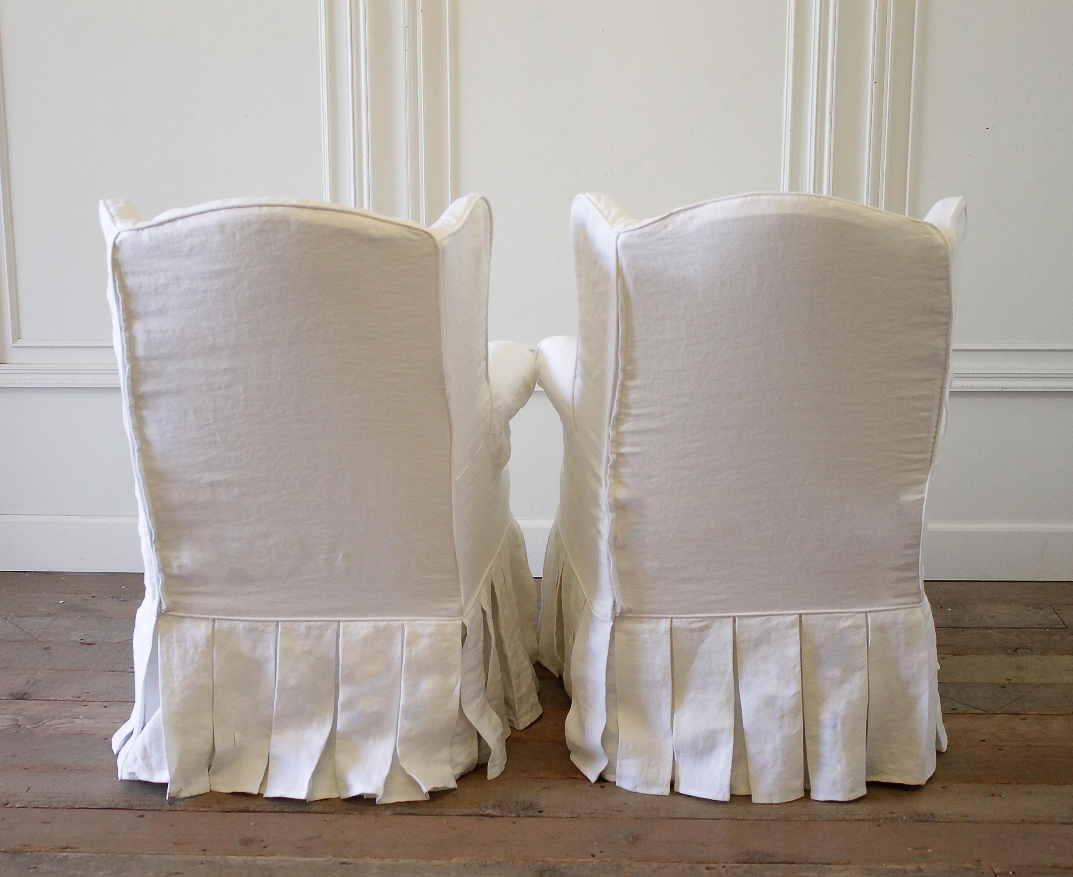 Canvas Pair of Slip Covered Linen Wing Chairs with Ruffle Skirt