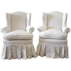 Pair of Slip Covered Linen Wing Chairs with Ruffle Skirt