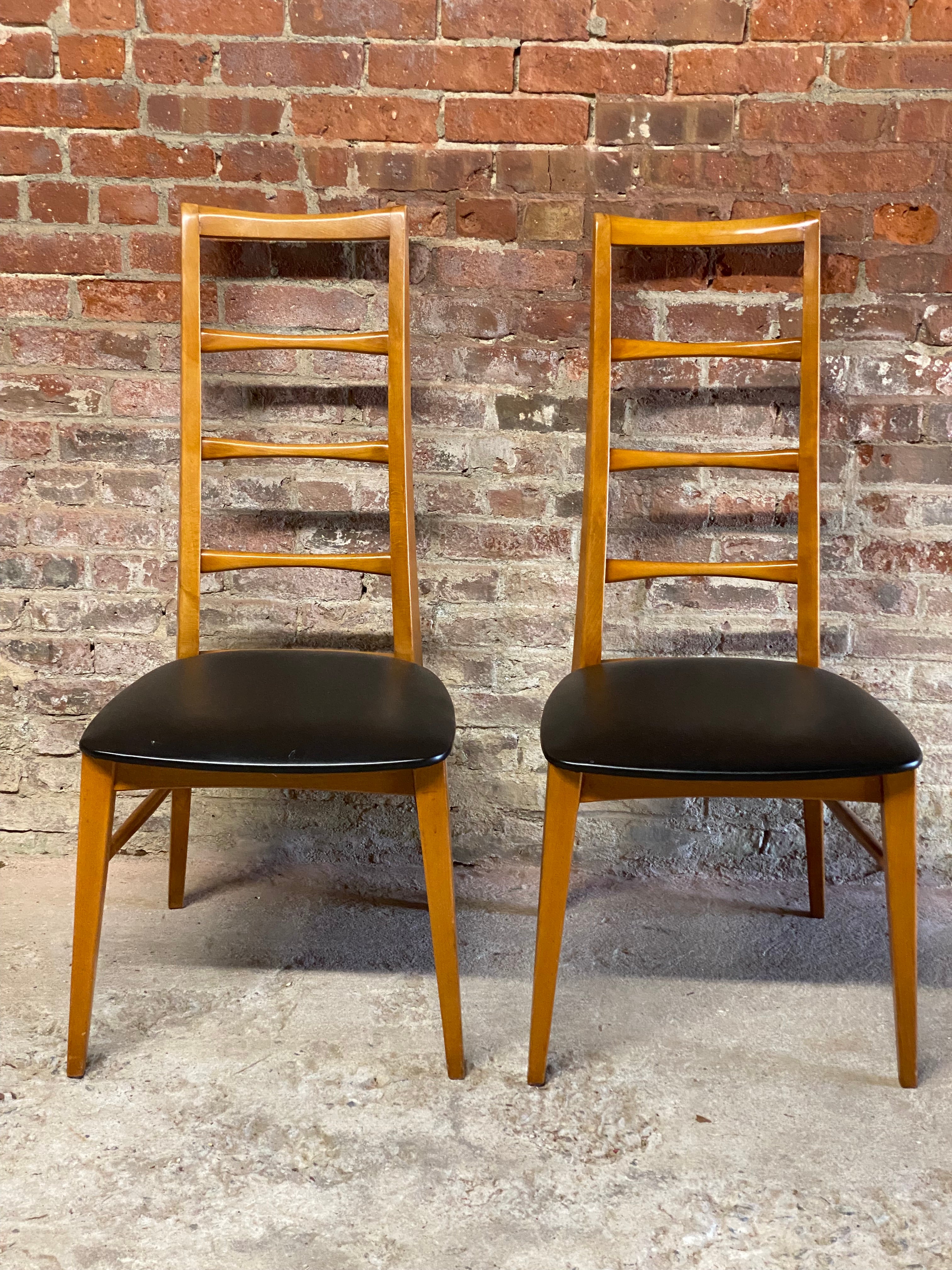 An elegant pair of Mid-Century Modern ladder back chairs in the manner of Neils Koefoed 
