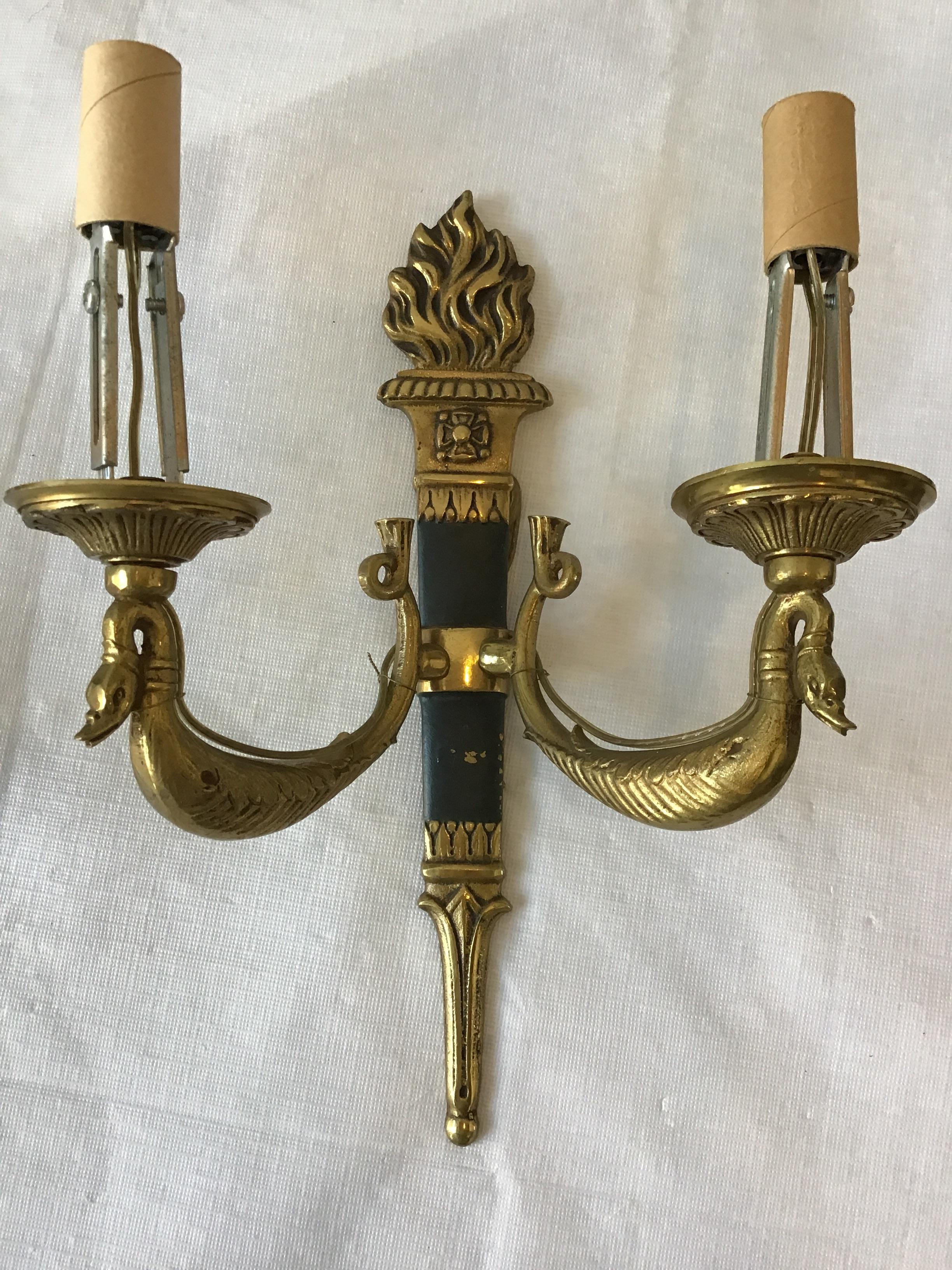 Pair of small 1950s brass classical sconces out of a Hampton’s estate.