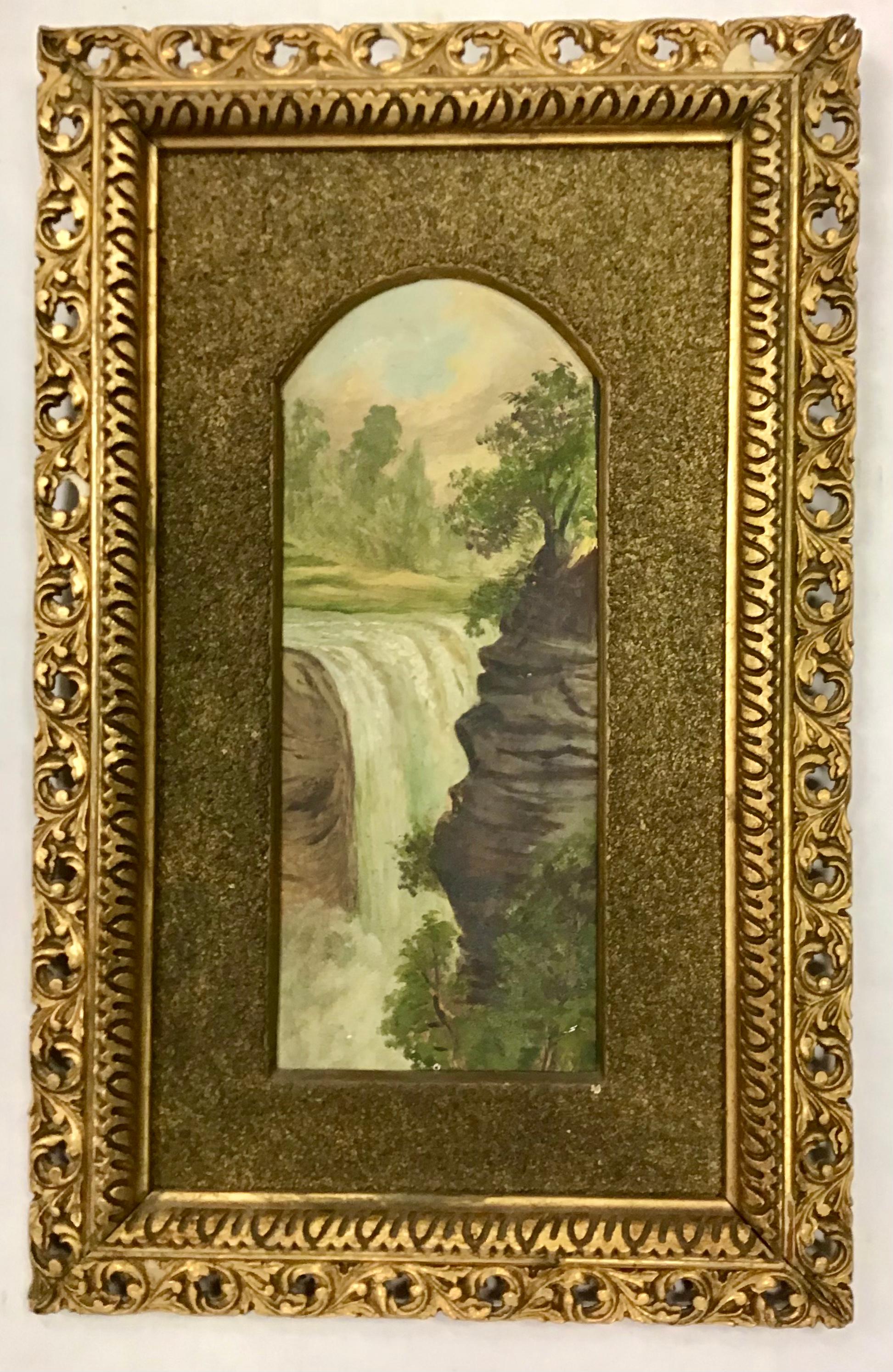 Pair of antique small Italian oil paintings depicting a waterfall and river. Both are displayed in an arched textured matting within a giltwood frame.