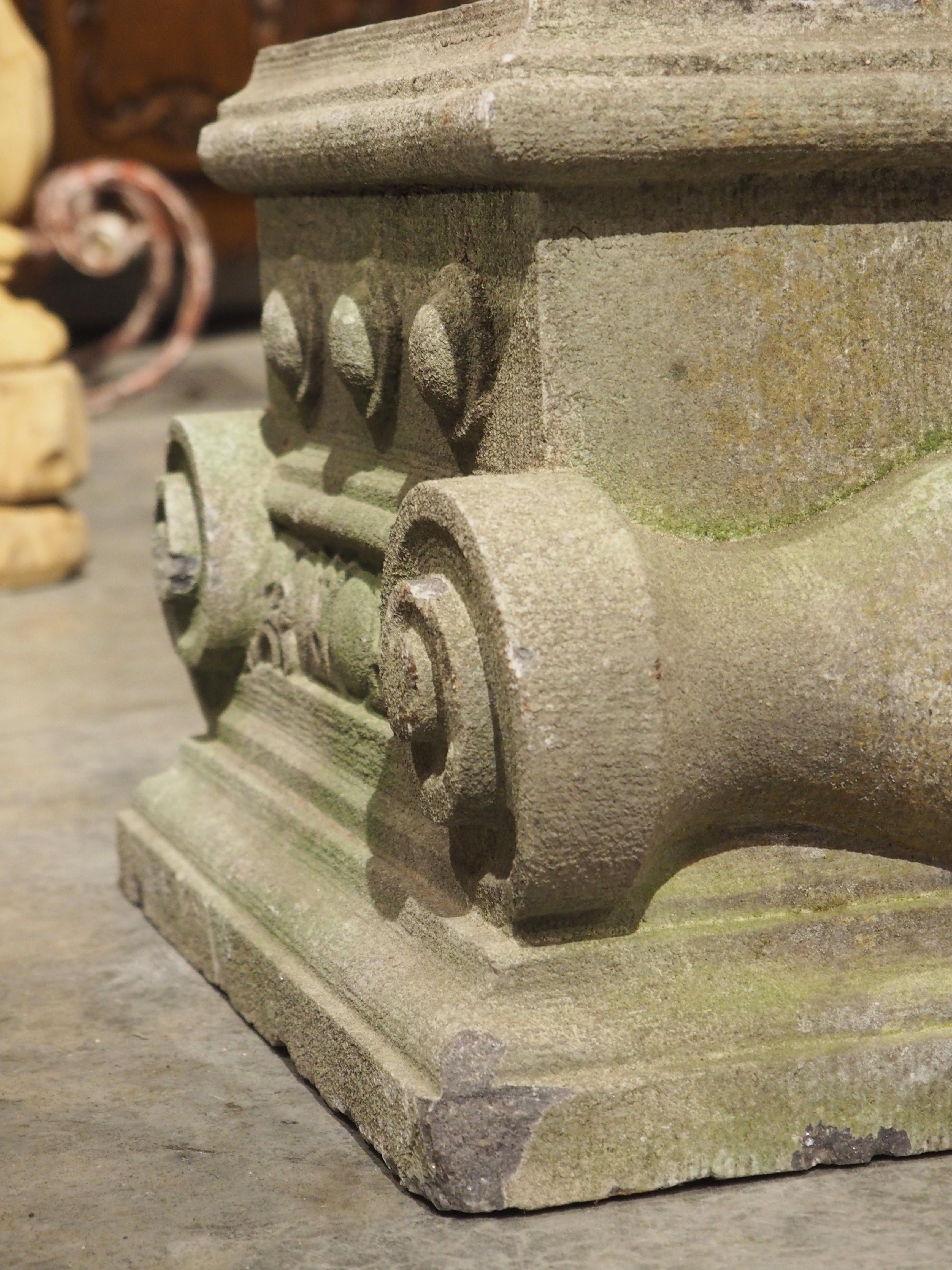 Hand-carved in Belgium in the 1800’s, this pair of small bluestone capitals has been inspired by the Ionic order of ancient civilizations (Greece and Rome). Ionic architecture is known for utilizing volutes, which are the large spiral-like elements