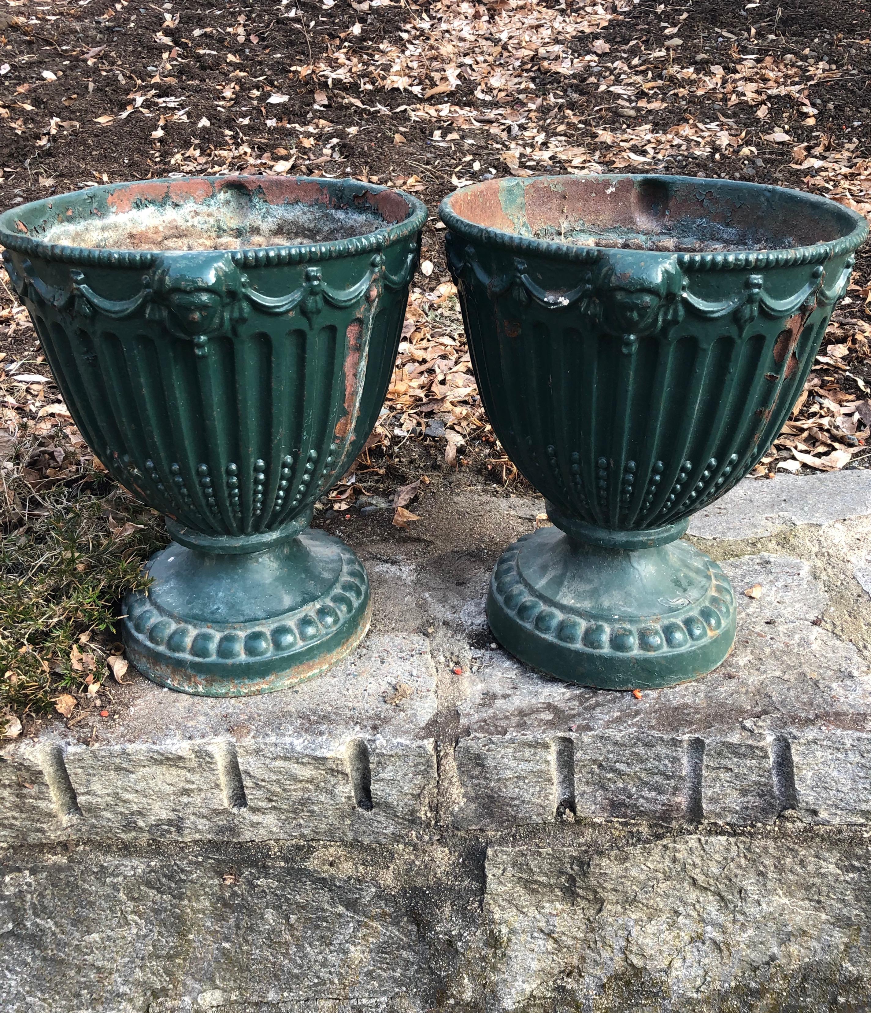 French Pair of Small 19th Century Cast Iron Adams Urns in Old Green Paint