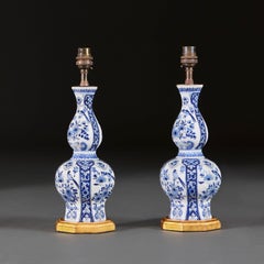 Pair of Small 19th Century Delft Blue and White Table Lamps with Giltwood Bases