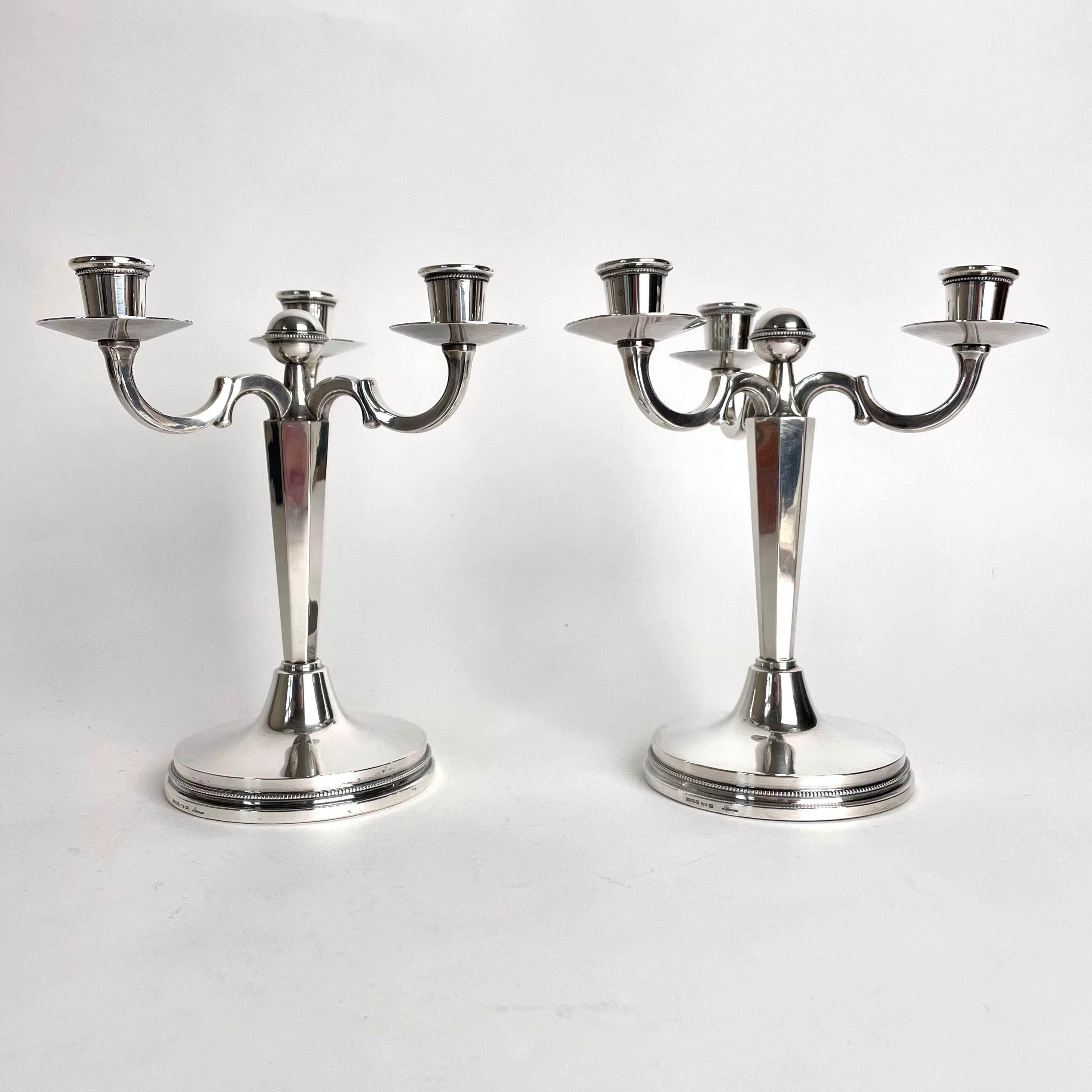 Swedish Pair of small and elegant candelabras in Silver by Eric Löfman, Sweden in 1972 For Sale