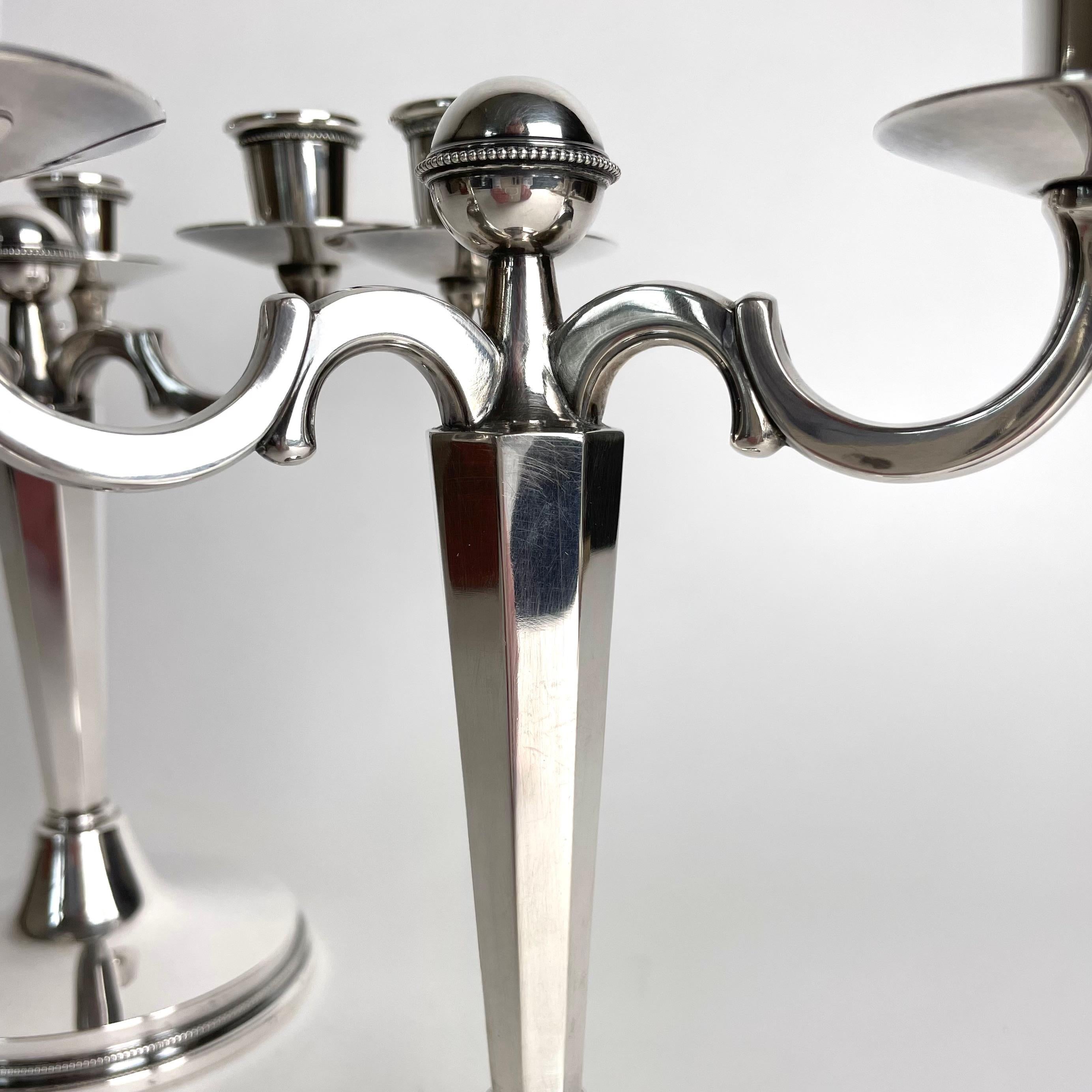 Late 20th Century Pair of small and elegant candelabras in Silver by Eric Löfman, Sweden in 1972 For Sale