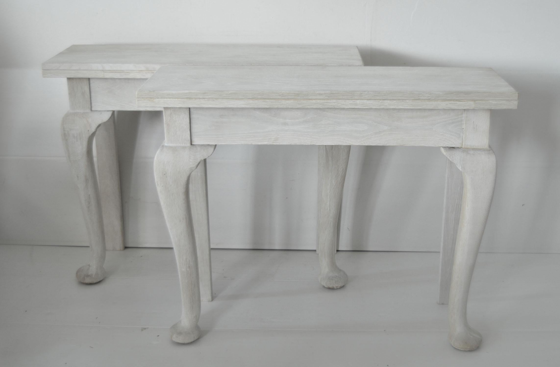 Very elegant pair of bleached oak console tables.

Wonderful simple lines

They have been adapted. They started life off as one table. Literally cut in two and replacement back legs using old material.

English, early 20th