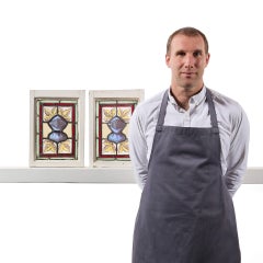 Pair of Small Antique English Stained Glass Windows Depicting Knight Helmets