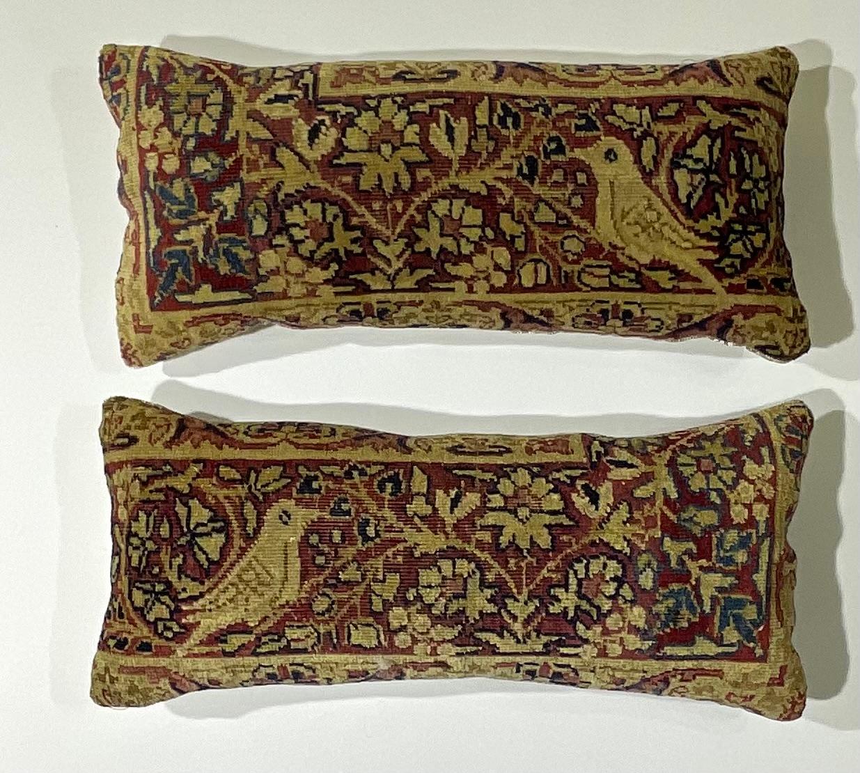 Beautiful pillows made of hand woven 19th century antique Lavar Carmon rug fragment, of two birds surrounded with vines and flowers. Fine fresh insert, quality linen backing.
Fragment is hand wash before become pillow.
Great addition to any room