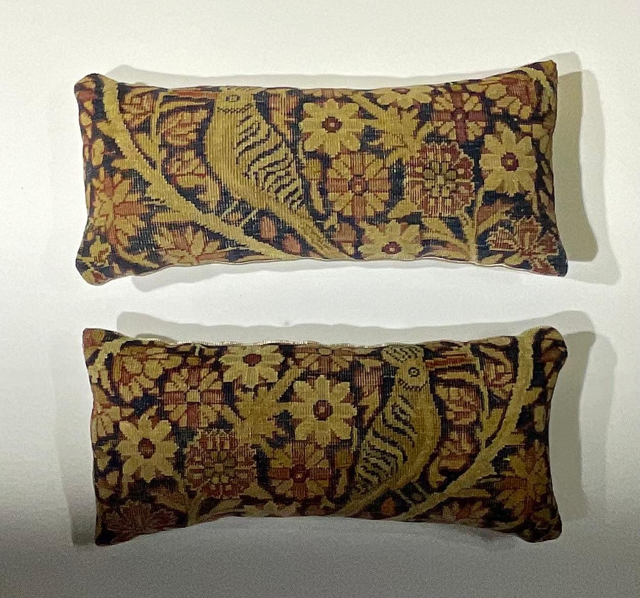 Beautiful pillows made of hand woven 19th century antique Lavar Carmon rug fragment, of two hoopoes birds surrounded with vines and flowers. Fine fresh insert, quality linen backing.
Fragment is hand wash before become pillow.
Great addition to