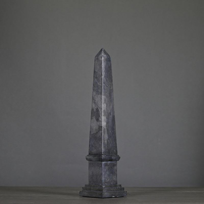 Pair of small black and grey marble obelisks in the Napoleon III style, 20th century.

Pair of small Napoleon III style obelisks, 20th century, in black and grey marble.
H: 40cm, W: 9cm, D: 9cm