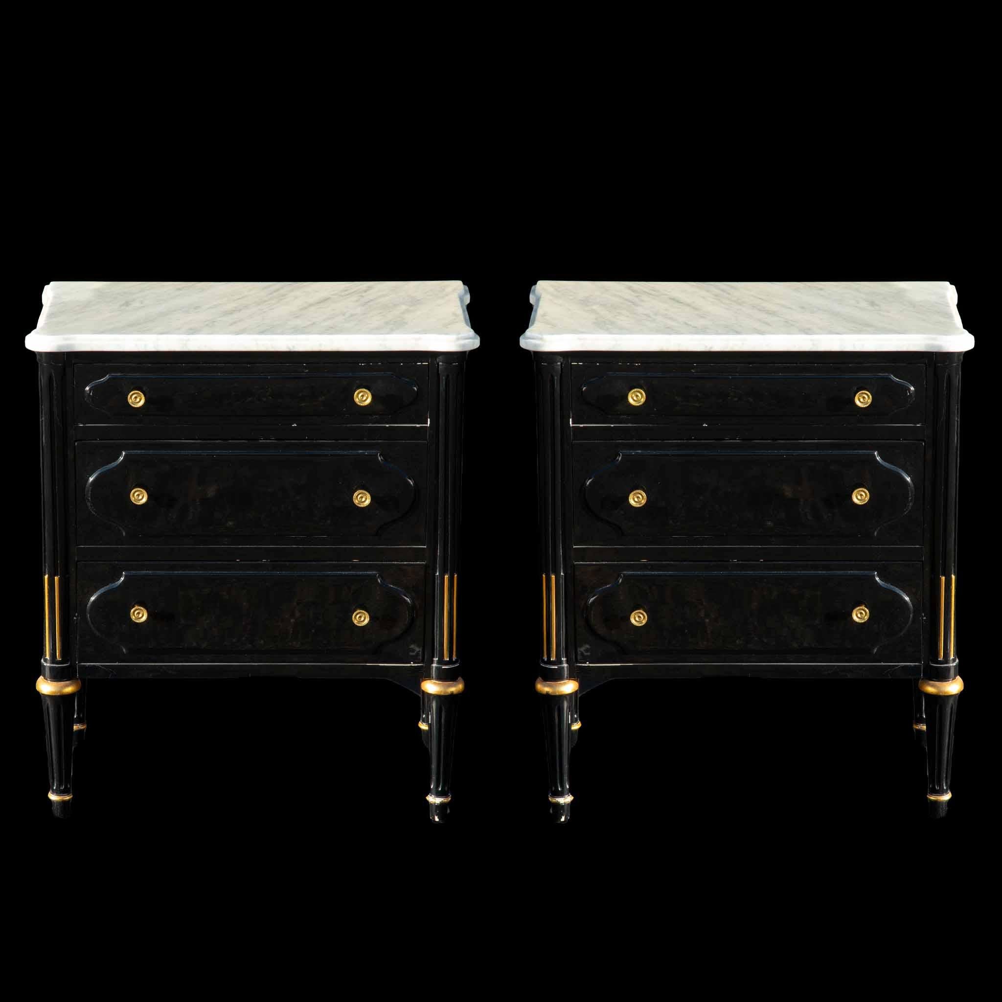 Exquisite pair of small dressers featuring a sleek black lacquer finish, elegant brass accents, and luxurious white marble tops. These versatile pieces not only serve as stylish storage solutions but also double as perfect bedside tables. Elevate