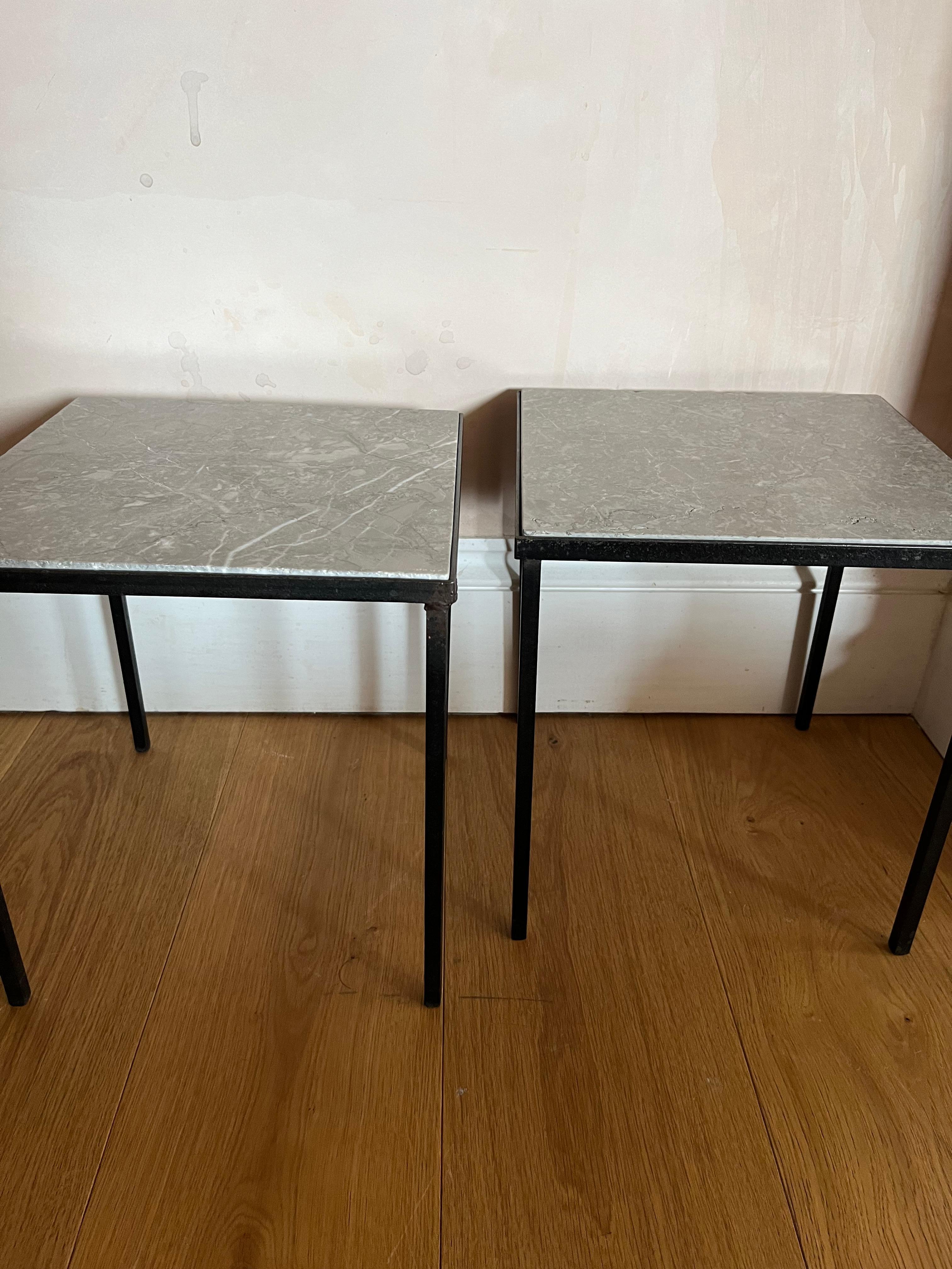 Mid-Century Modern Pair of small black metal and stone side tables.