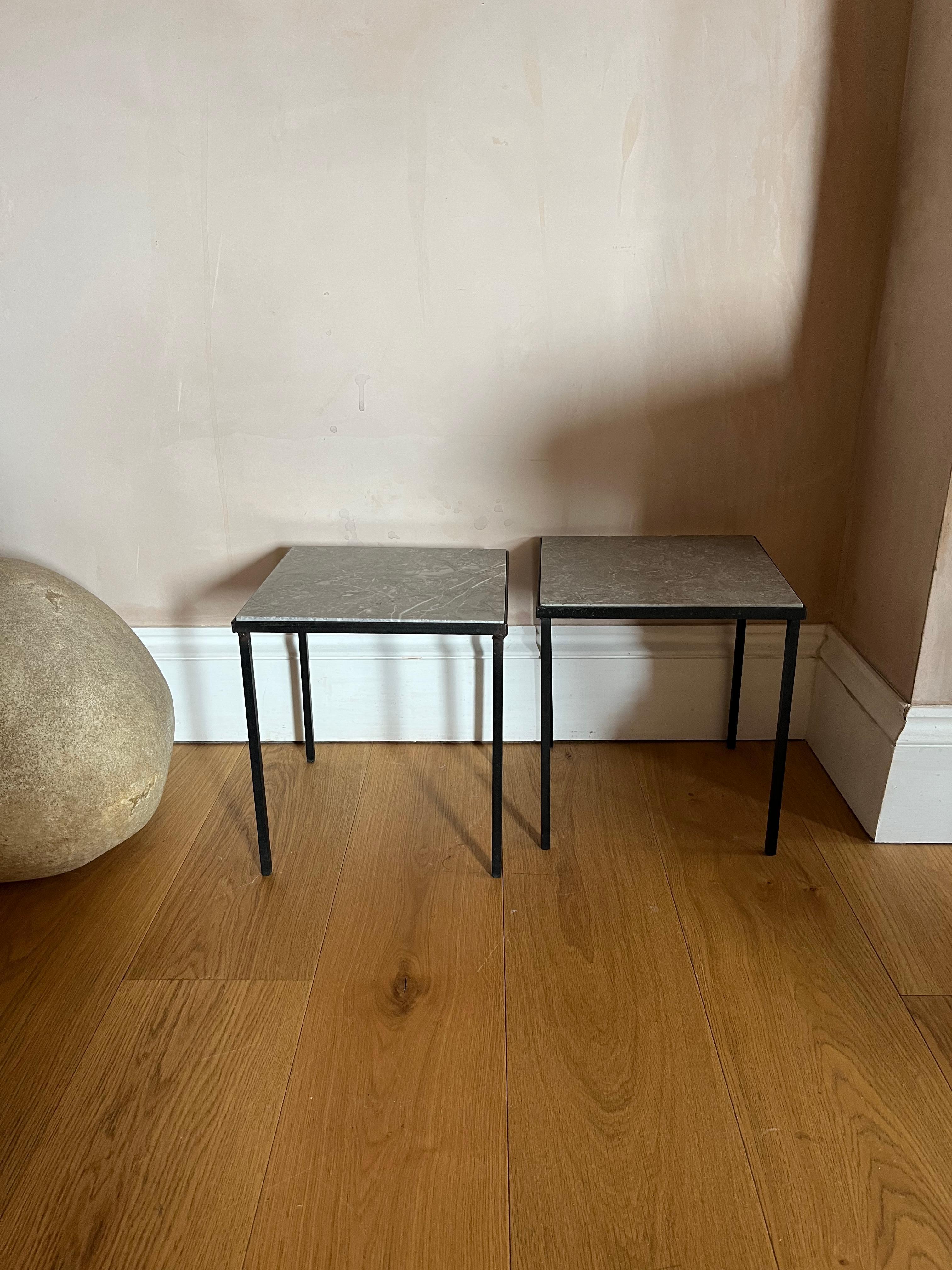 20th Century Pair of small black metal and stone side tables.