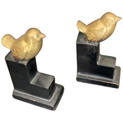 Paire de petits serre-livres en bronze