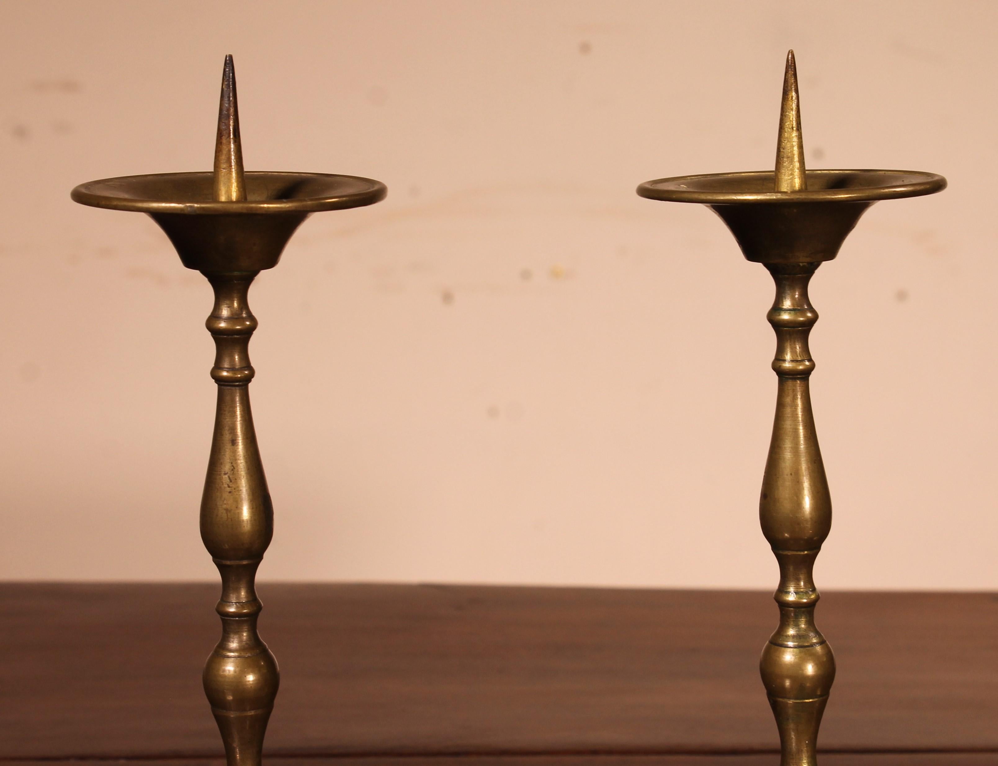 charming little pair of bronze candlesticks which were made in France during the 18th century.

pair of candlesticks which is small in size which is unusual and rare

Superb patina and in magnificent condition with their threads that unscrew.