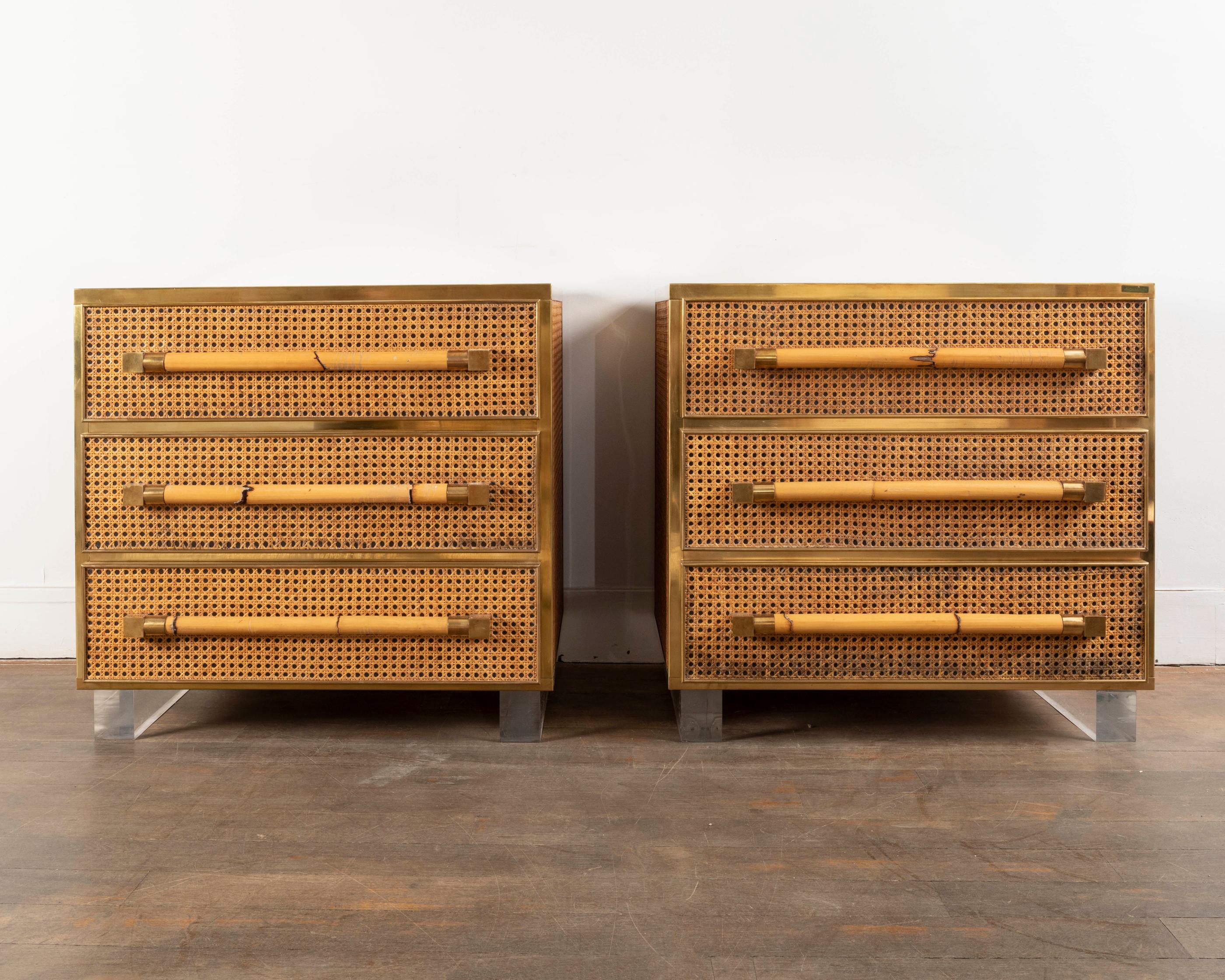 Pair of small commodes / large nightstands designed by Sandro Petti, manufactured by Metalarte.
3 drawers; caned sides and drawers with brass framing, mirrored tops, acrylic bases
signed Sando Petti,
Italy, 1970s.