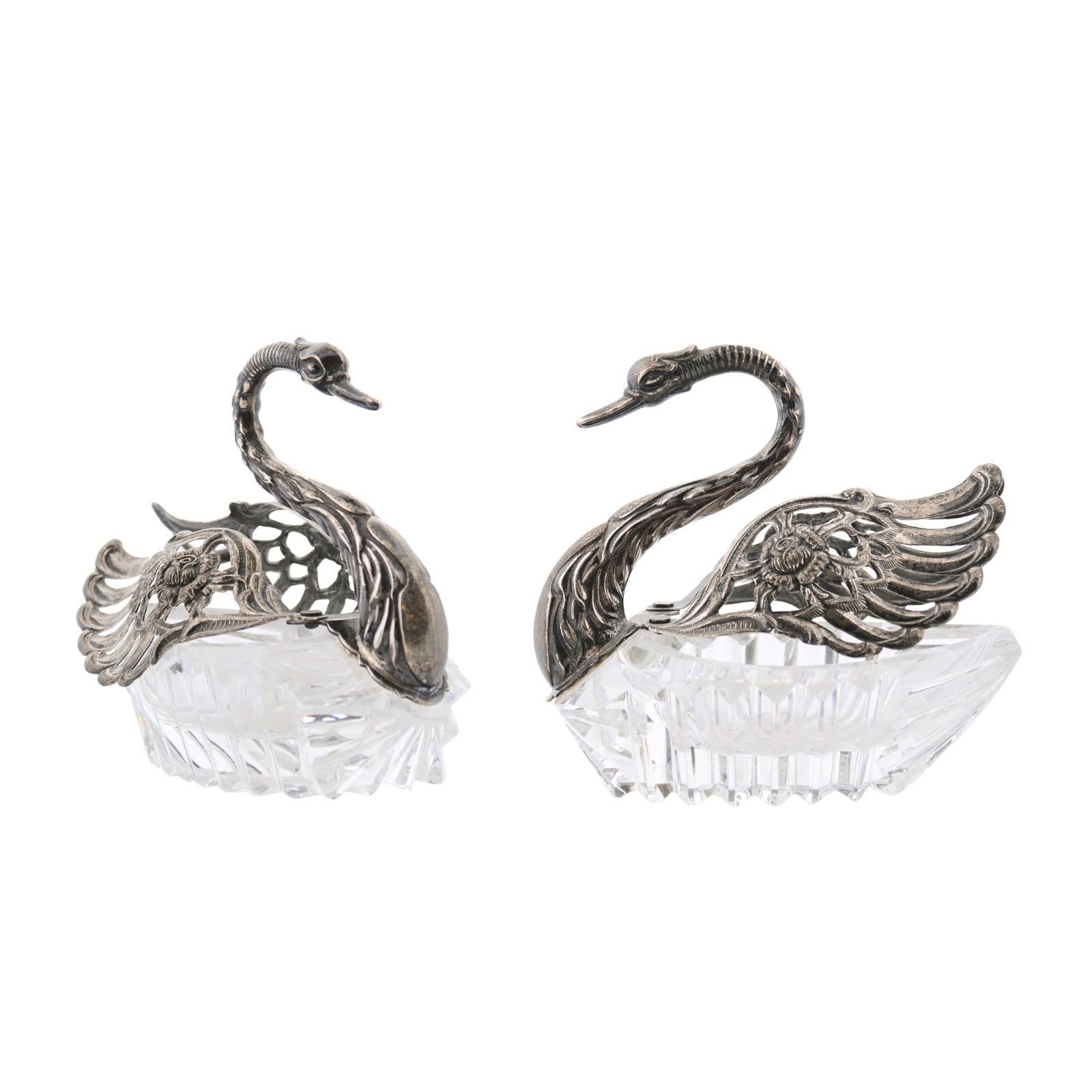 Pair of Small English 20th Century Crystal Swans with Opening Silver Wings