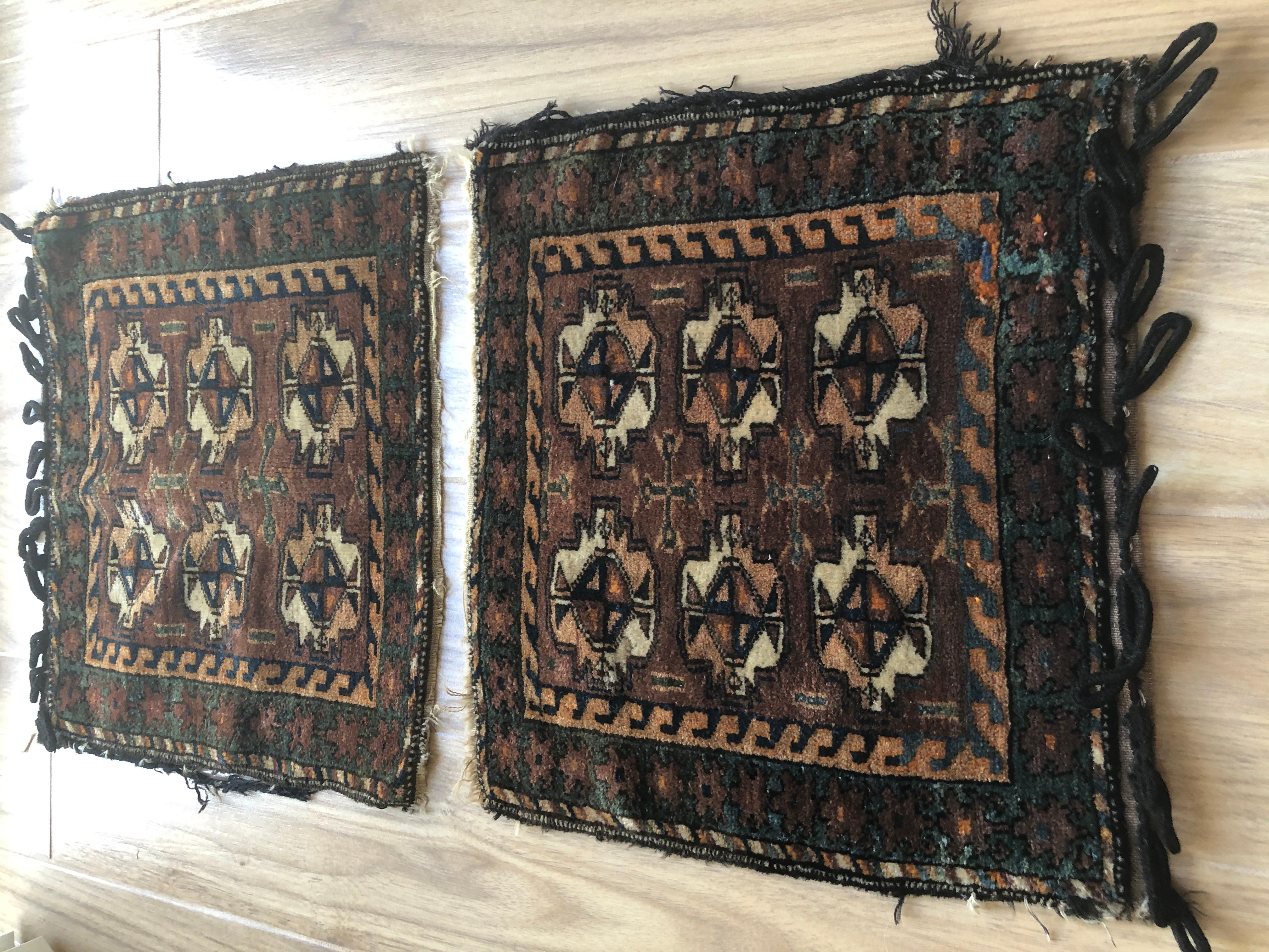Pair of small hand knotted wool decorative rugs