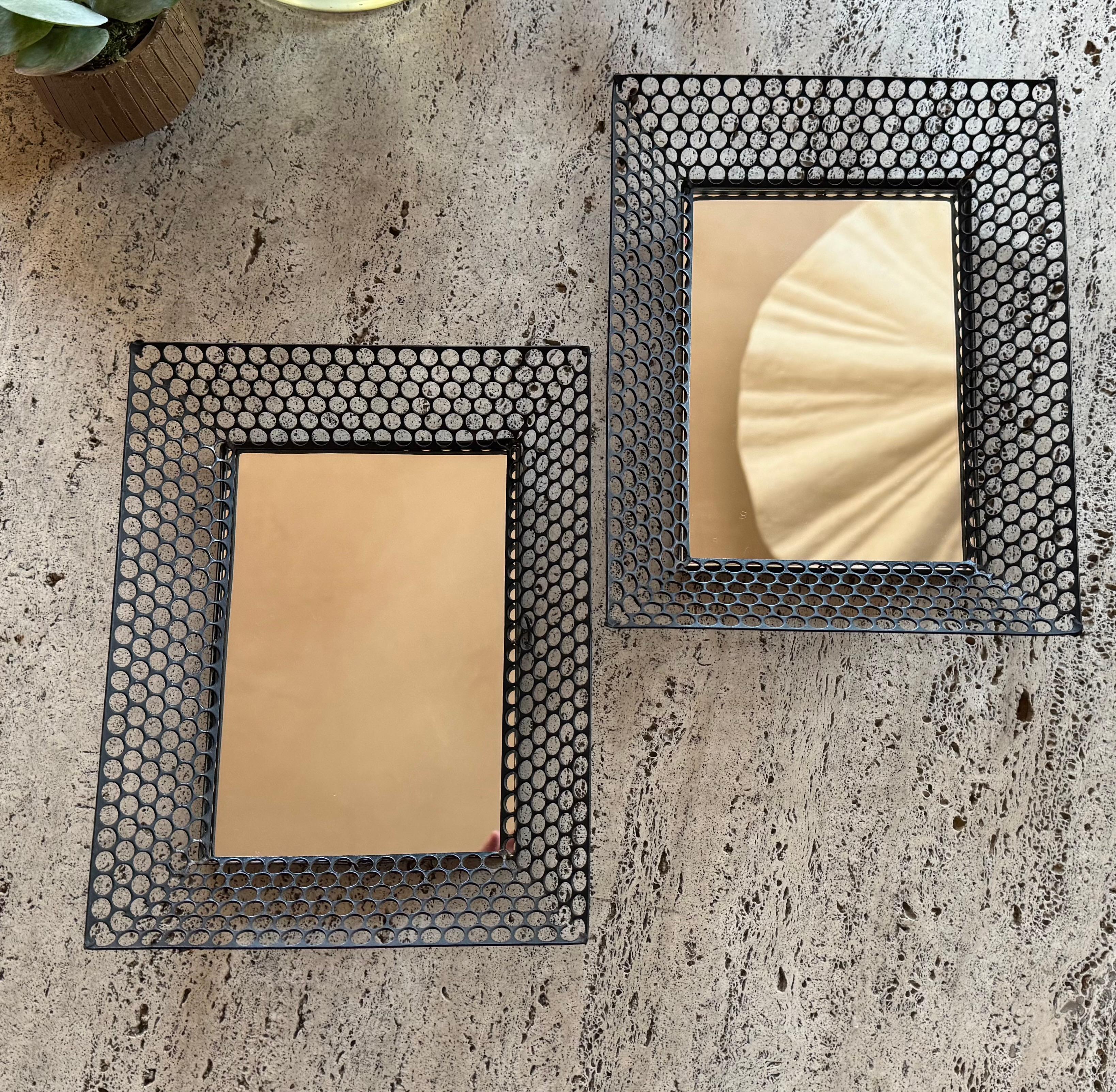 Pair of French pierced metal framed mirrors. Mirrors new replacements 