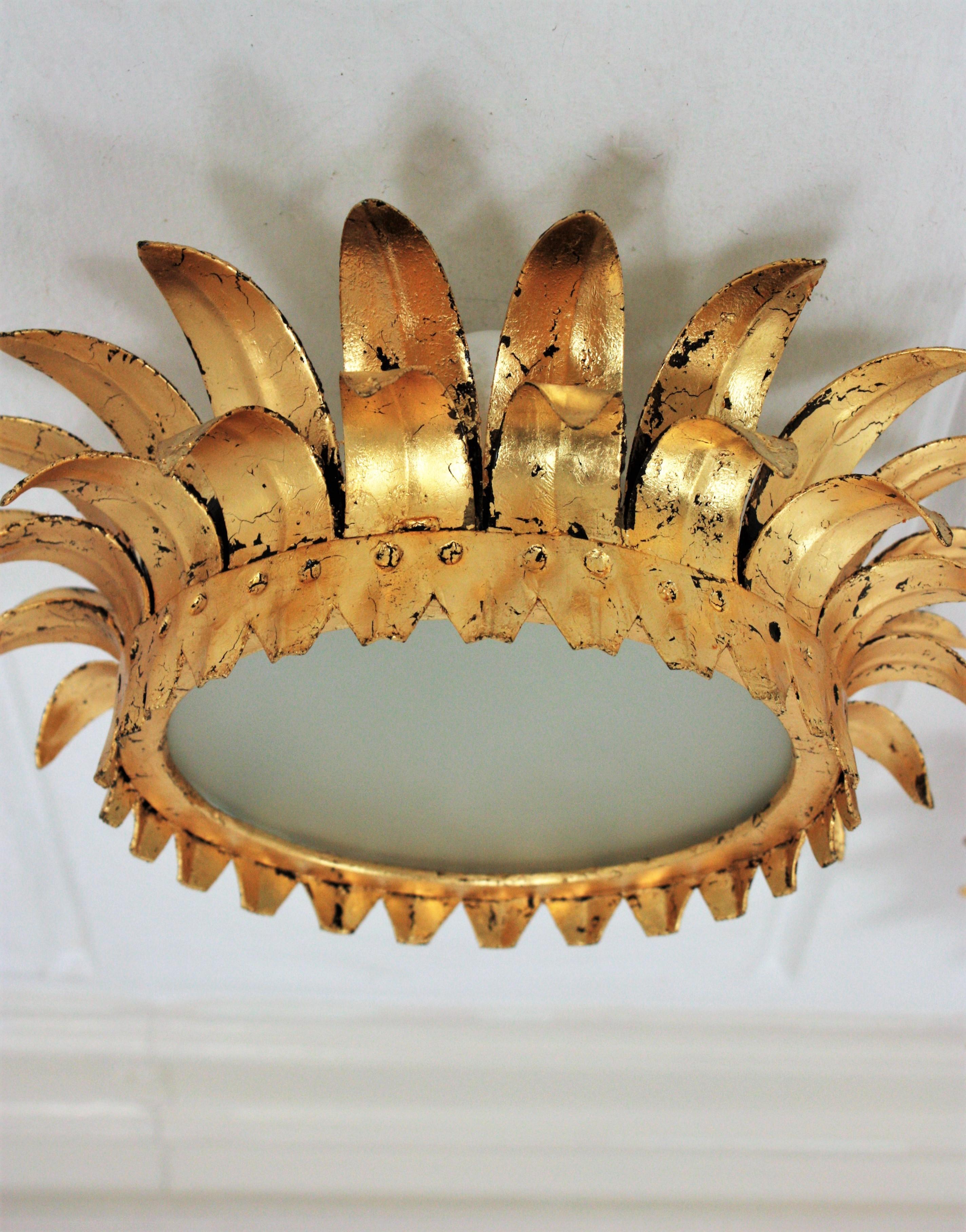 Pair of Small French Neoclassical Gilt Iron Crown Sunburst Light Fixtures In Good Condition For Sale In Barcelona, ES