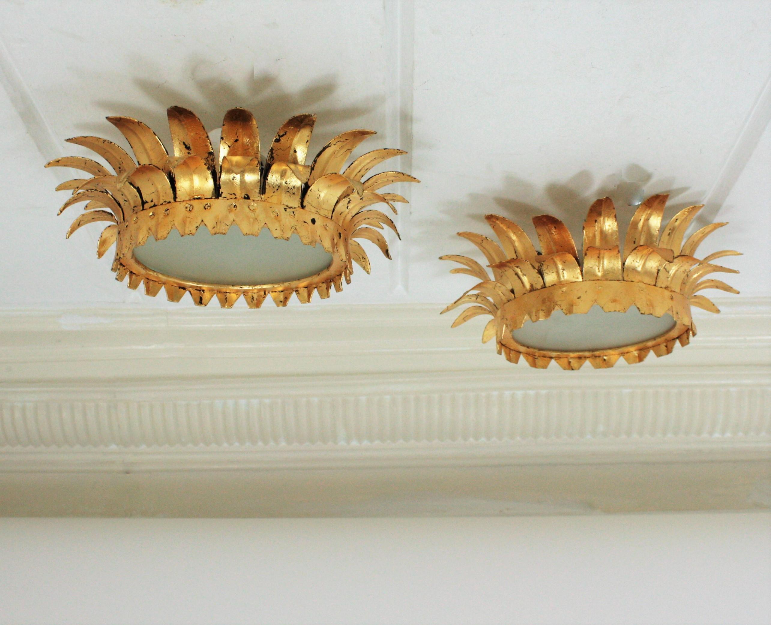 Gold Leaf Pair of Small French Neoclassical Gilt Iron Crown Sunburst Light Fixtures For Sale
