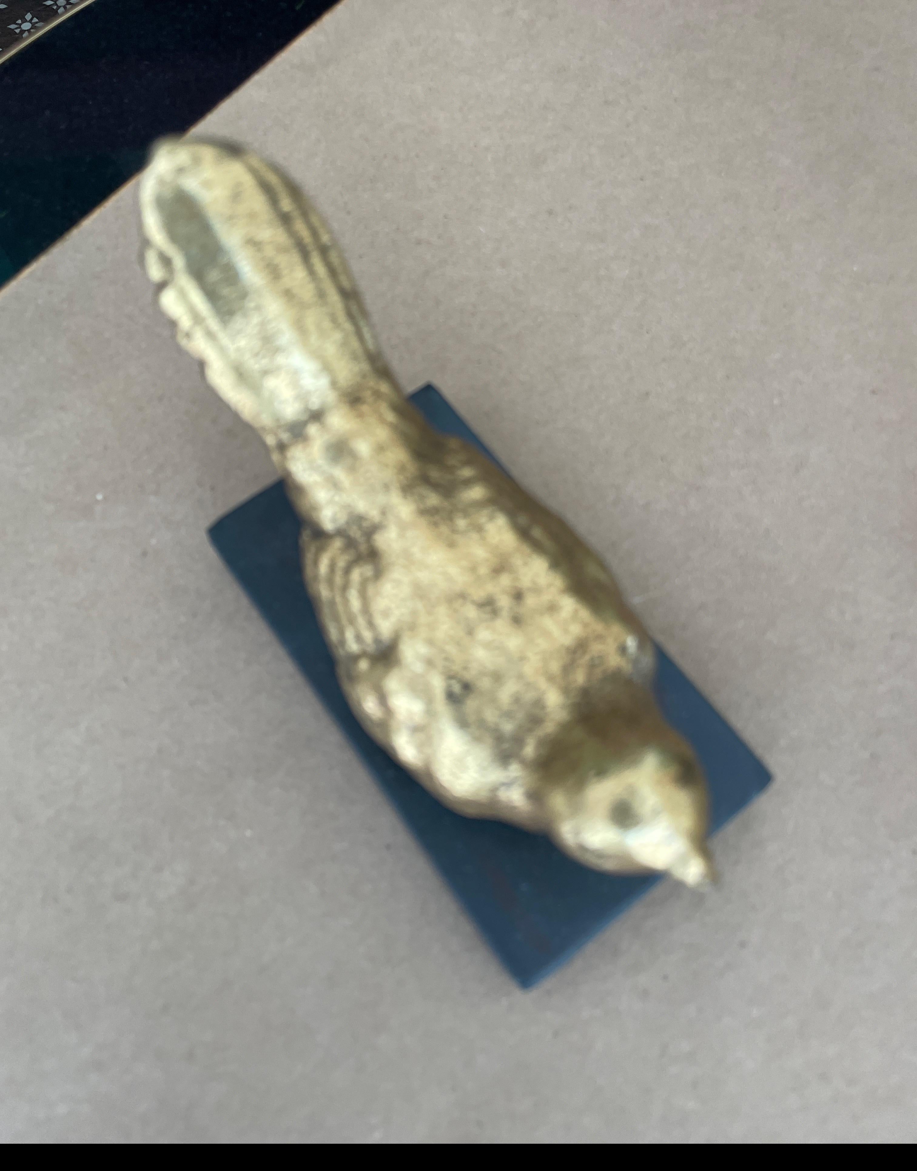 Pair of small, gilded birds on black metal rectangular base. Very decorative pieces. Lovely to enhance a table setting.