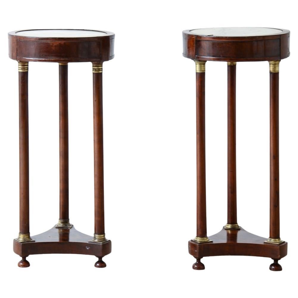 pair of small Gueridon with three columns and drum top with inset marble For Sale