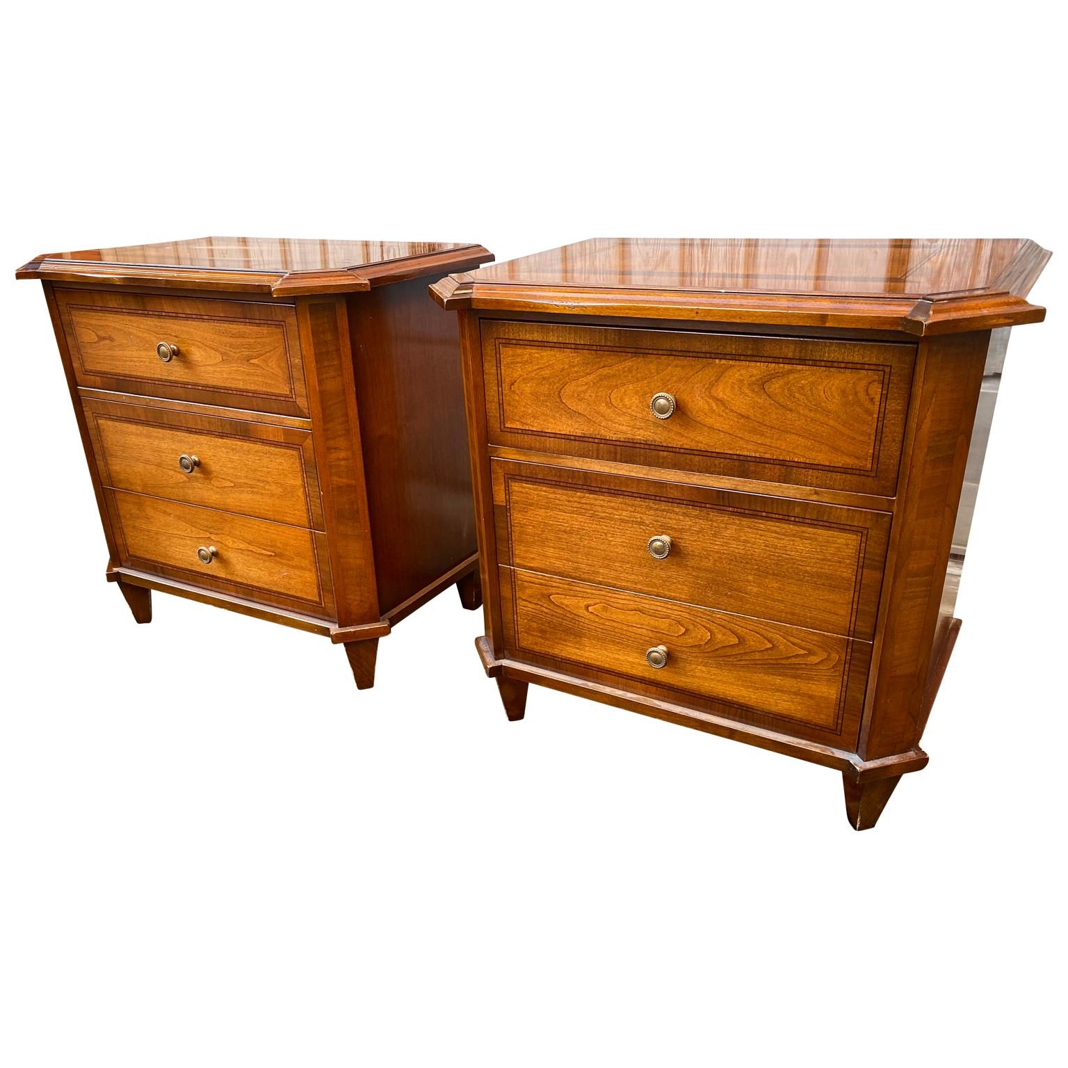 A pair of small Mid-20th Century Italian chests of drawer in walnut, marked 