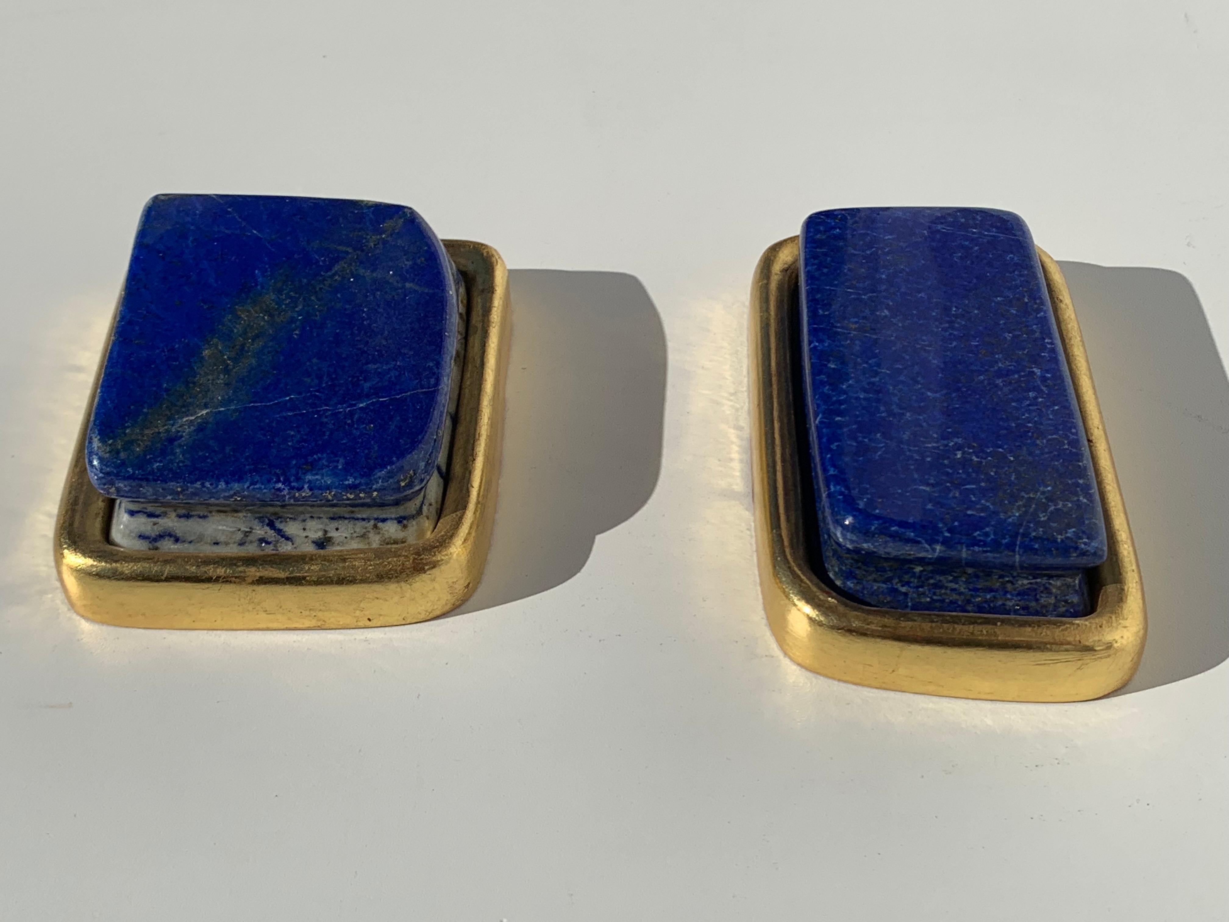 Pair of small lapis lazuli and 22-karat gold leaf paper weights
Large is 3.5