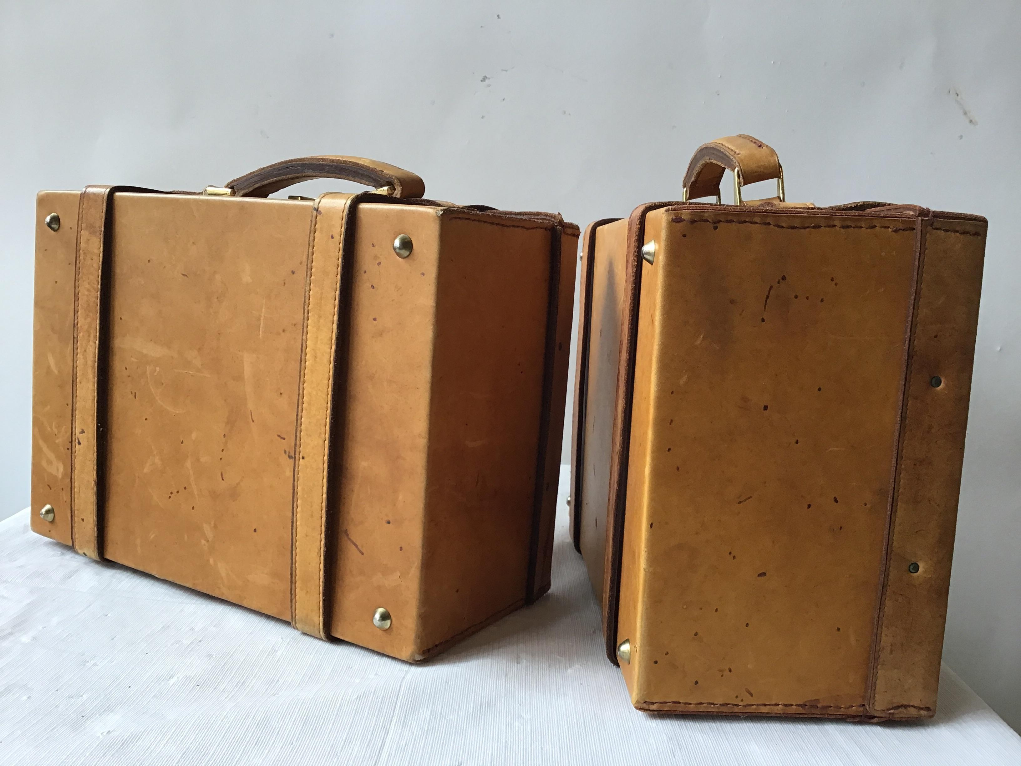 Pair of small leather suitcases. Great quality.