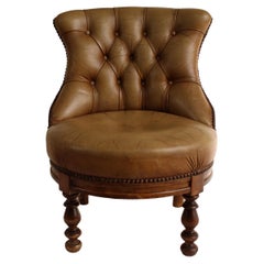Pair of Small Leather Upholstered Bergers, Capitoné