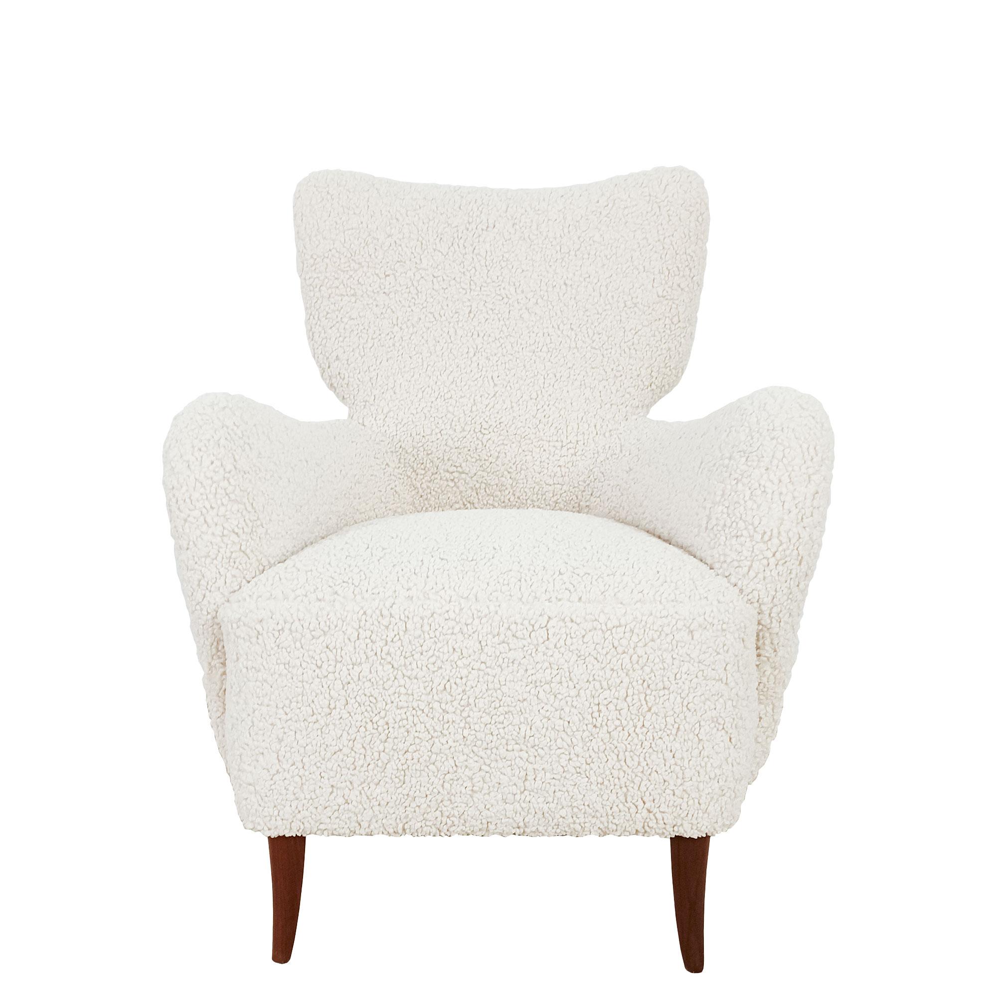 Pair of small low armchairs, solid mahogany legs, fillings and upholstery completely new, off-white bouclette fabric.

Italy c. 1940.