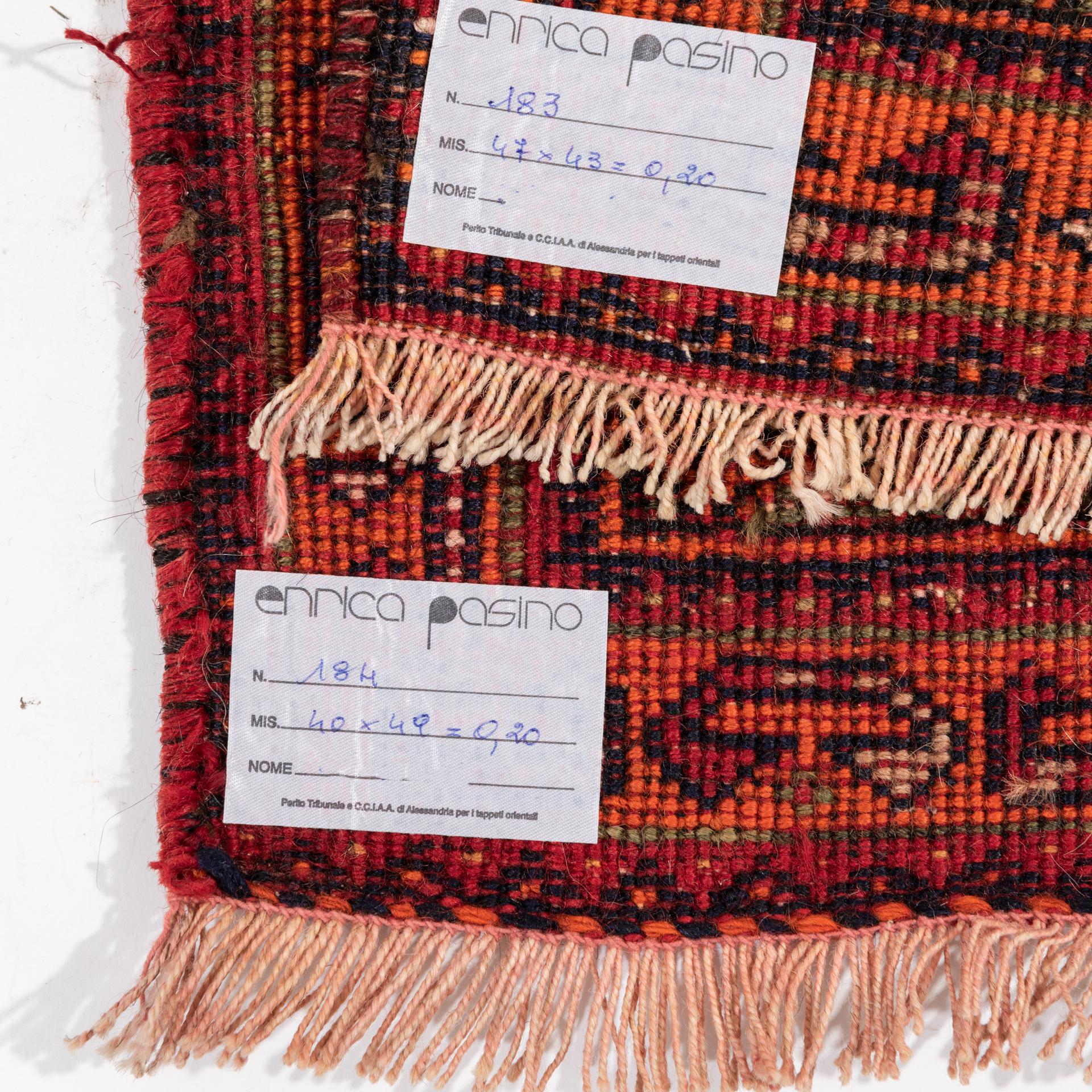 Pair of small nomadic rugs, probably the sides of a worn-out saddle-bag.
They have a nice design and pleasant vegetable colors, to be placed wherever You want.
They can also be made into cushions.

ref. nr. 183 and 184.