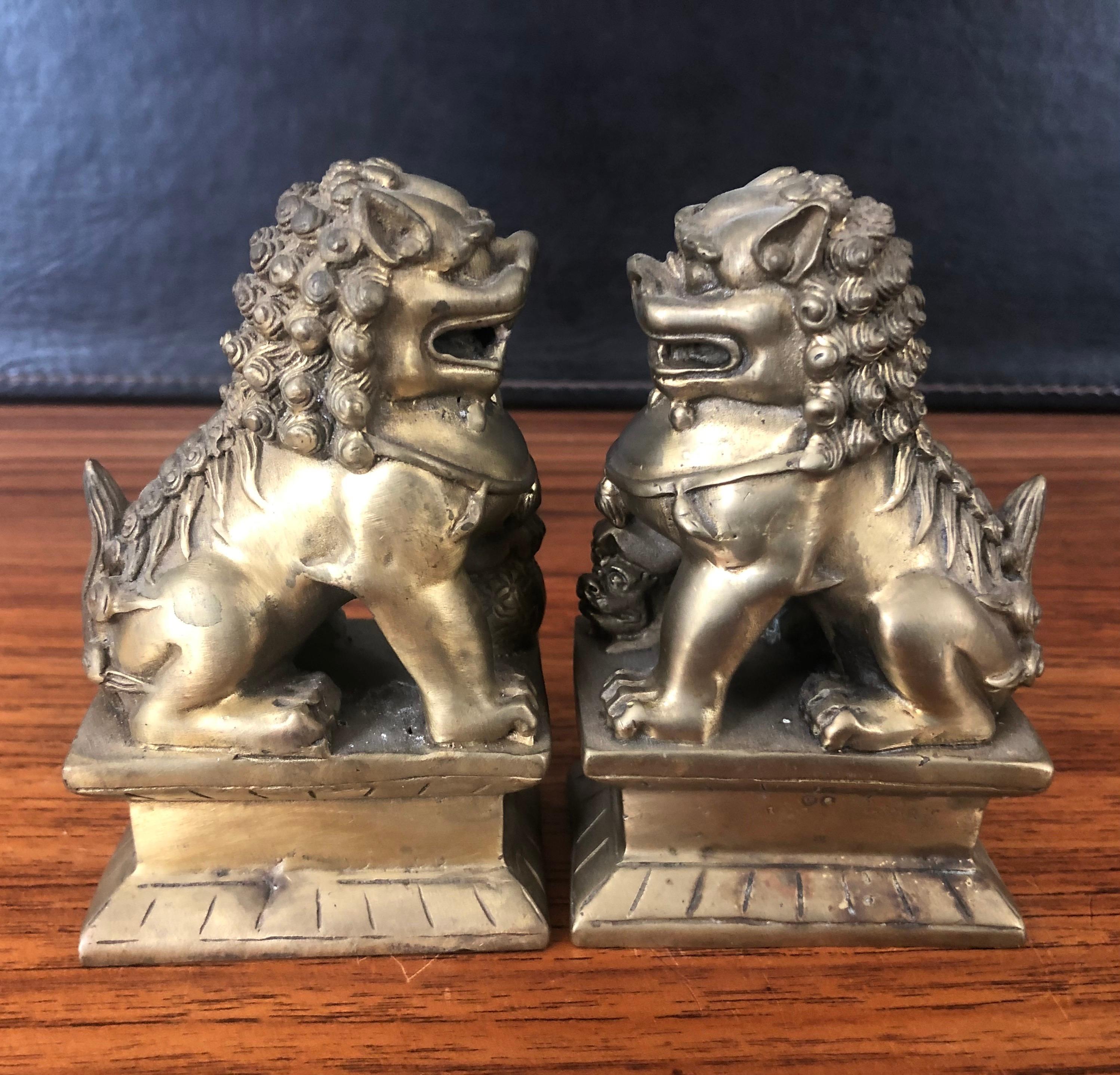 20th Century Pair of Small Patinated Bronze Chinese Foo Dogs For Sale