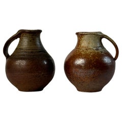 Pair of small pitcher by Jacky Coville