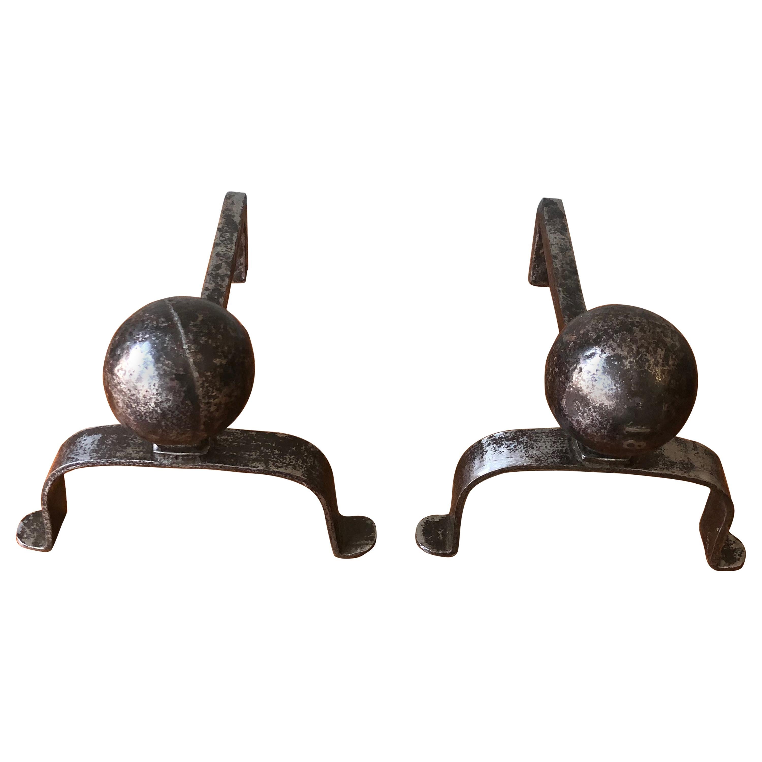 Pair of Small Polished Iron Andirons with Large Ball Mounts