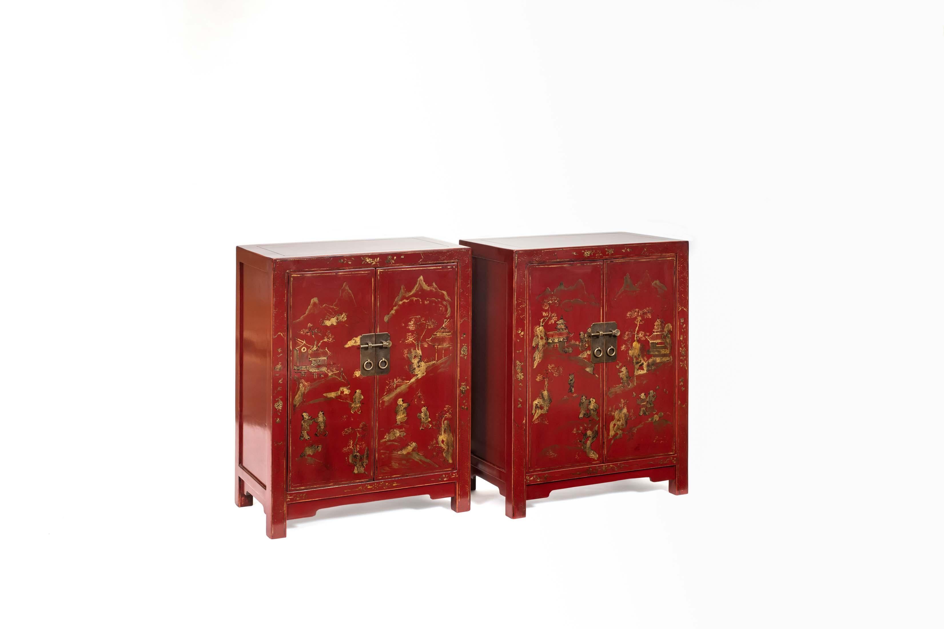 Chinese Pair of Small Red Lacquer Cabinets Handpainted with Gilt Children in Courtyard