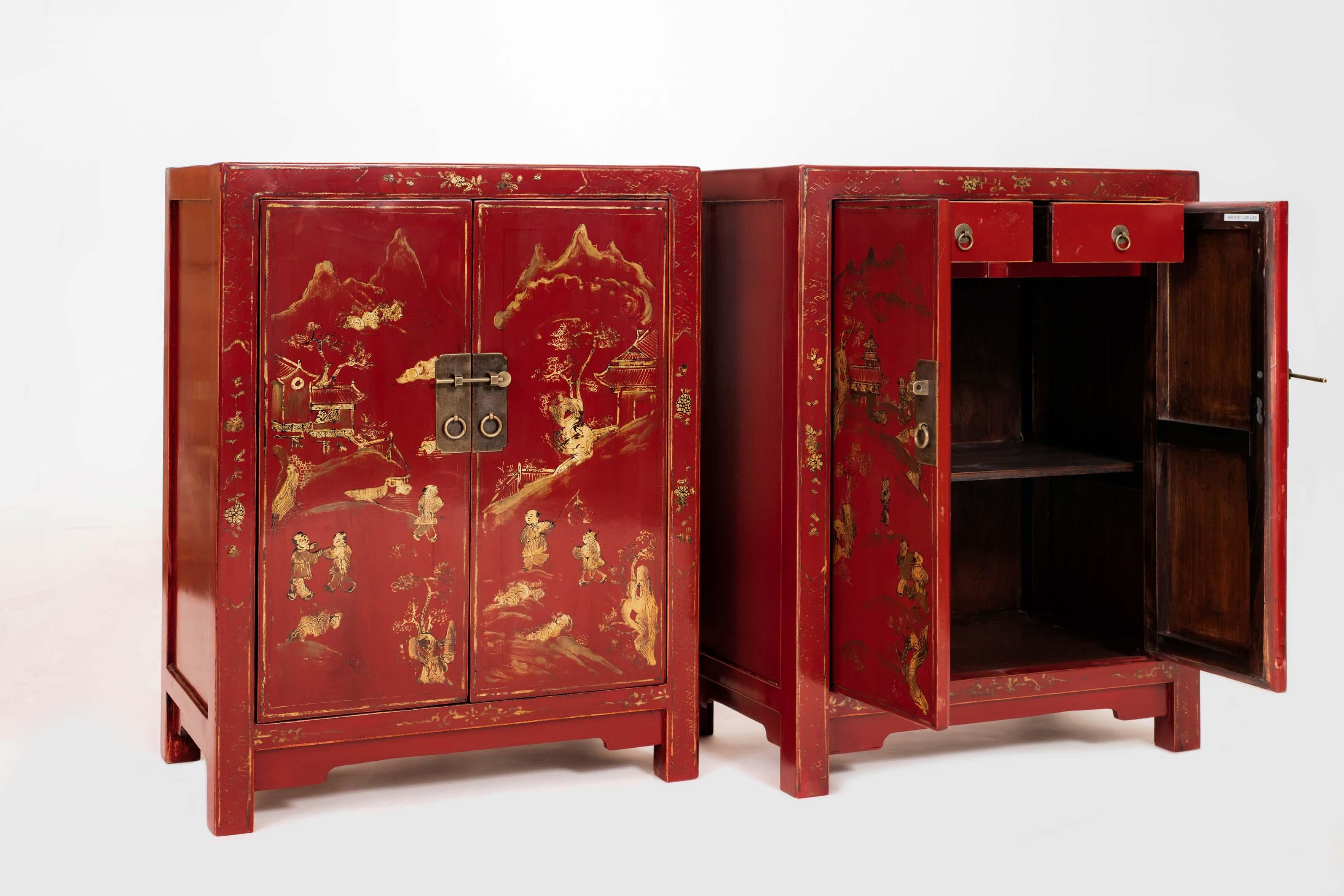 Hand-Crafted Pair of Small Red Lacquer Cabinets Handpainted with Gilt Children in Courtyard