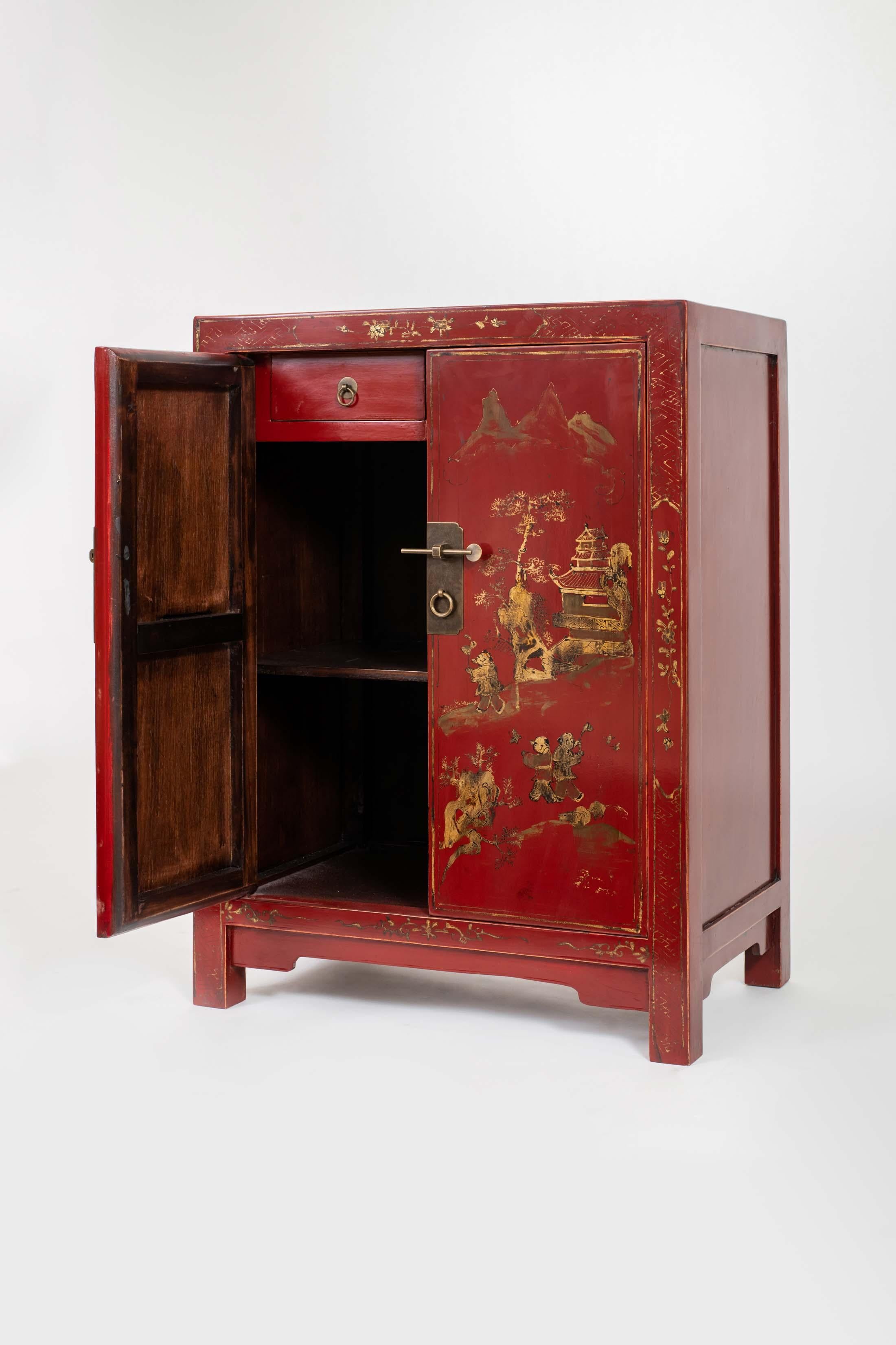 Pair of Small Red Lacquer Cabinets Handpainted with Gilt Children in Courtyard In Good Condition In 10 Chater Road, HK