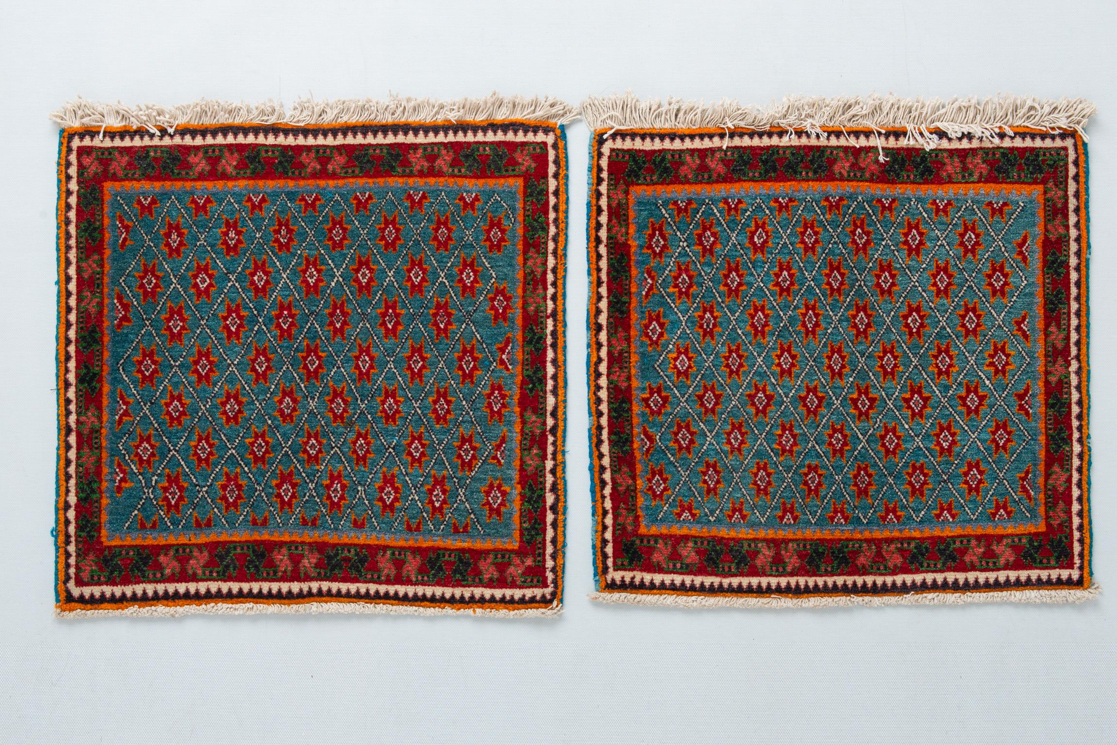 Pair of small rugs, used as seat on the large rug, or as a backrest on the wall. 
Rare to find perfect like these ones. On request I can prepare cushions.
They are perfect also on Your armchairs.