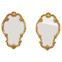 Pair of Small Scale Early 20th Century French Regency Style Gilt Wood Mirrors