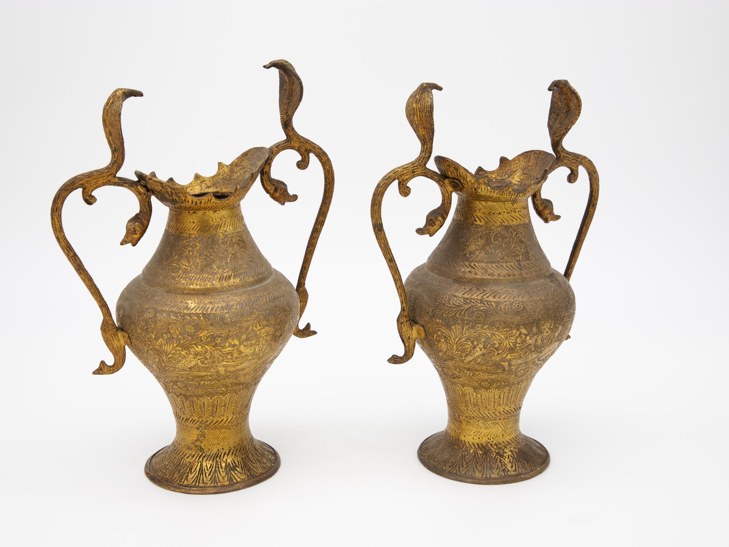 Pair of brass snake handle etched vases.