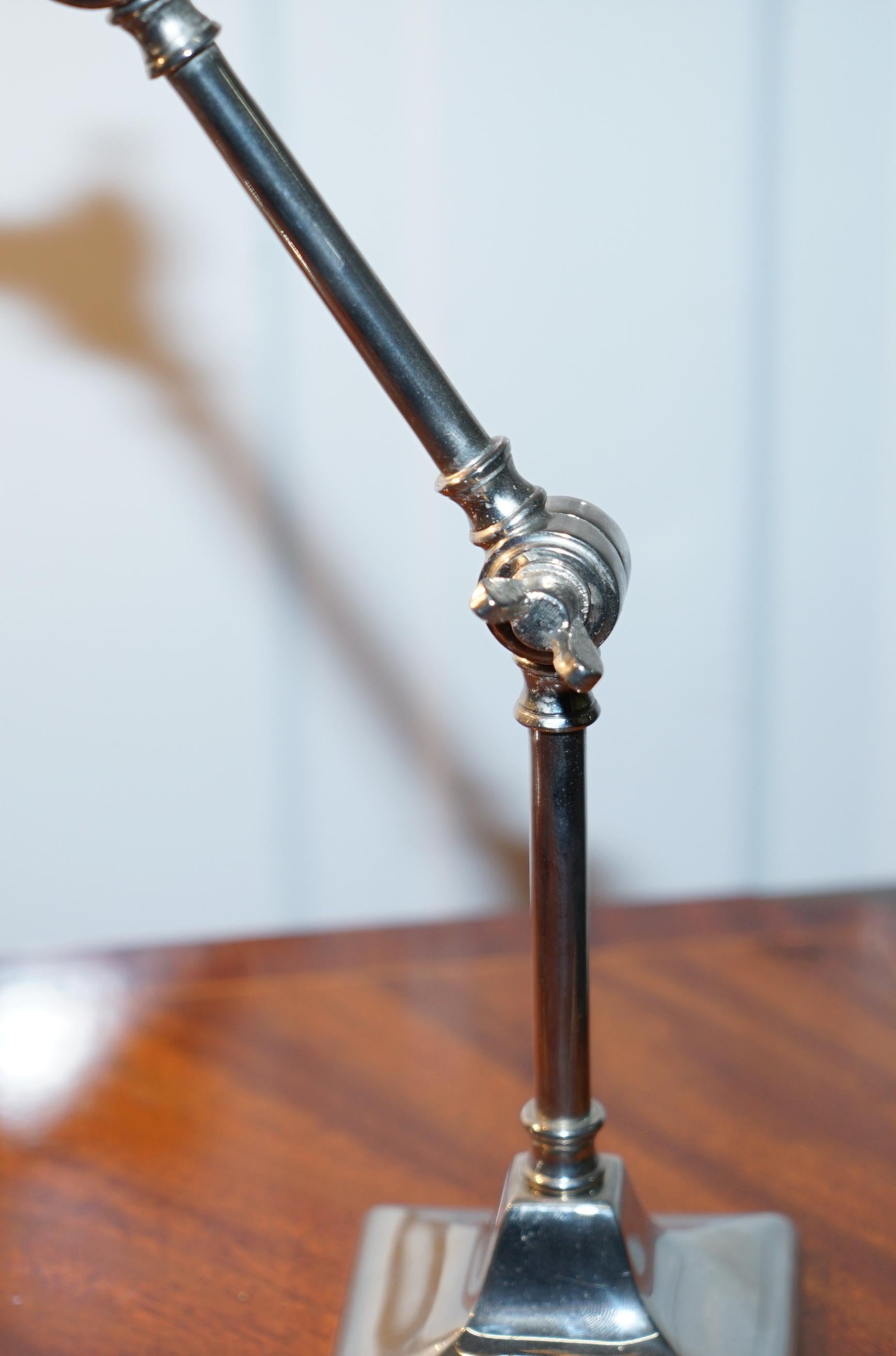 Pair of Small Solid Polished Metal Table Lamps with Two Points of Articulation 1